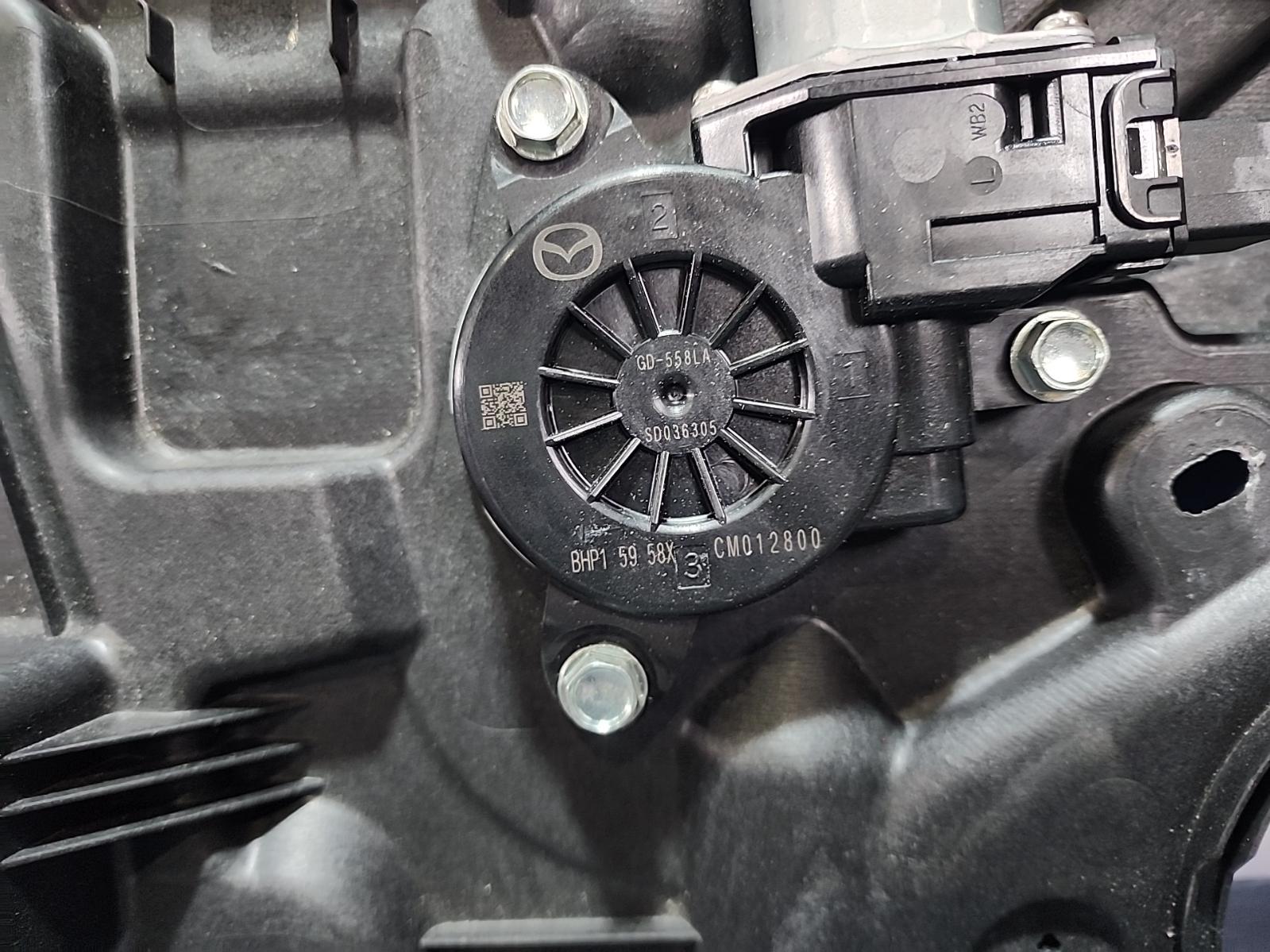 2015 Mazda 3 Left Front Window Reg/Motor View Auto part Left Front Window Reg/Motor Mazda 3 2015