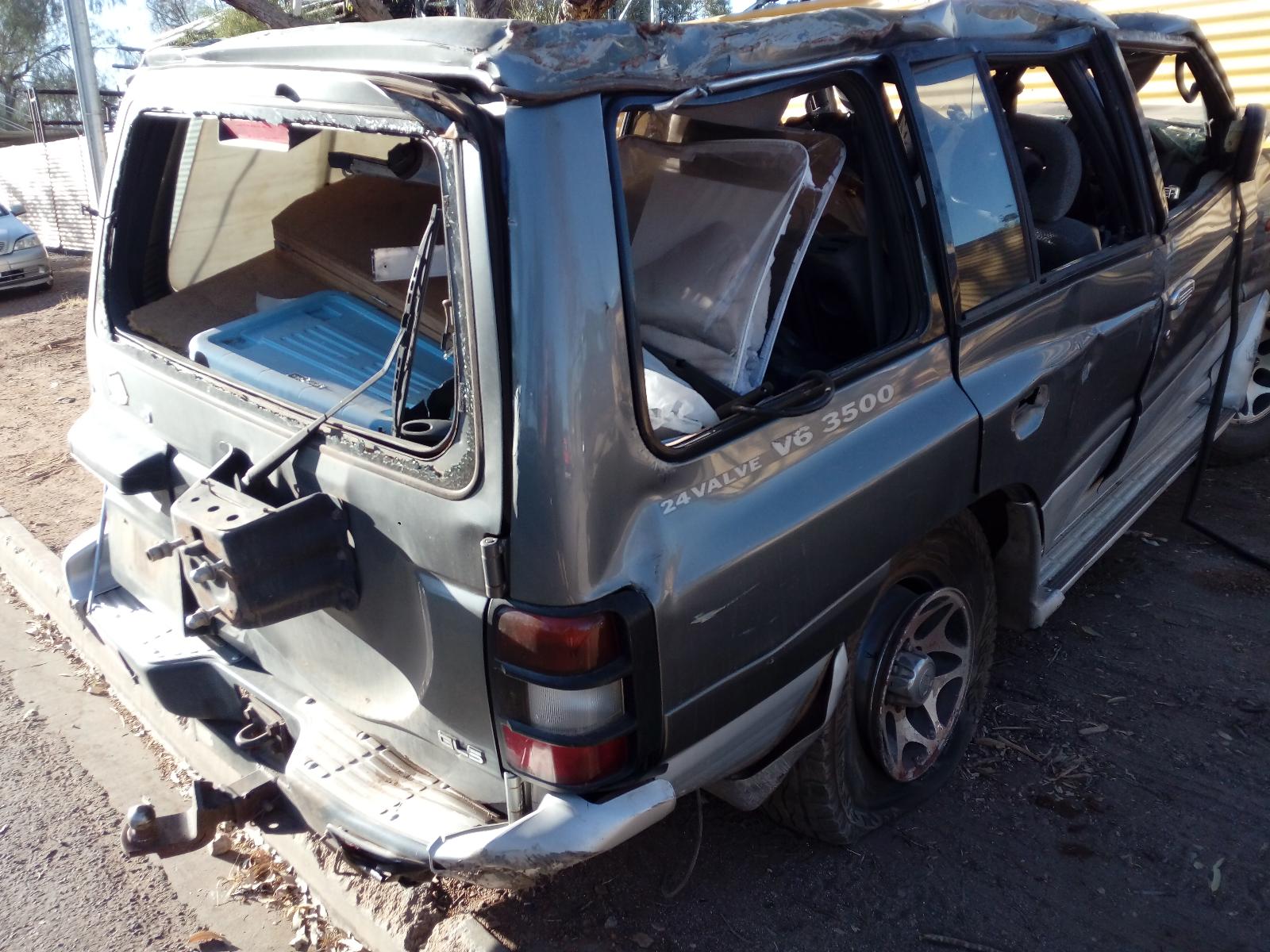 1998 Mitsubishi Pajero Wheel Cover/Hub Cap View Auto part Wheel Cover/Hub Cap Mitsubishi Pajero 1998