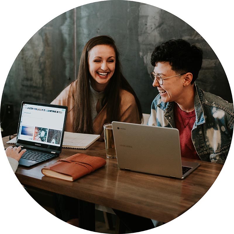 two people working together circle