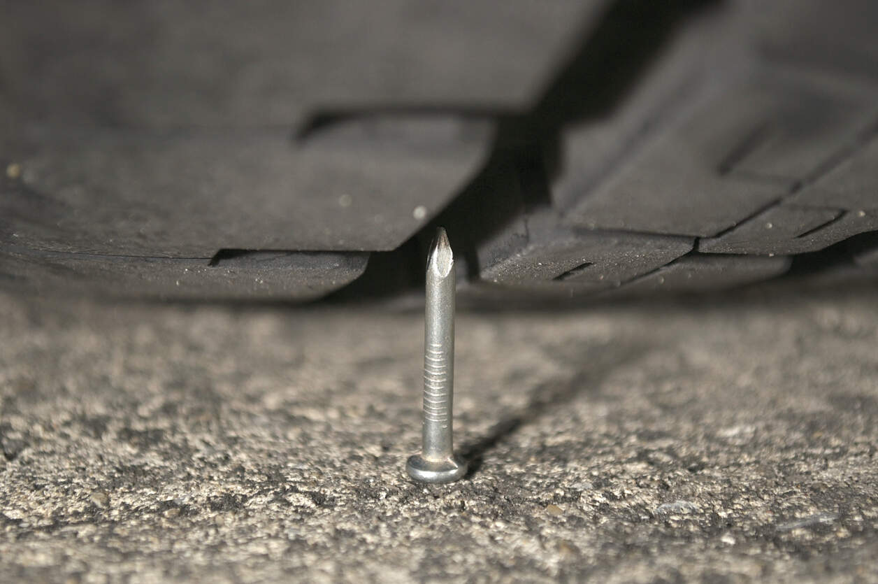Nails and screws may be found everywhere on the road, and a flat tyre might happen when you least expect it. A tyre and a nail