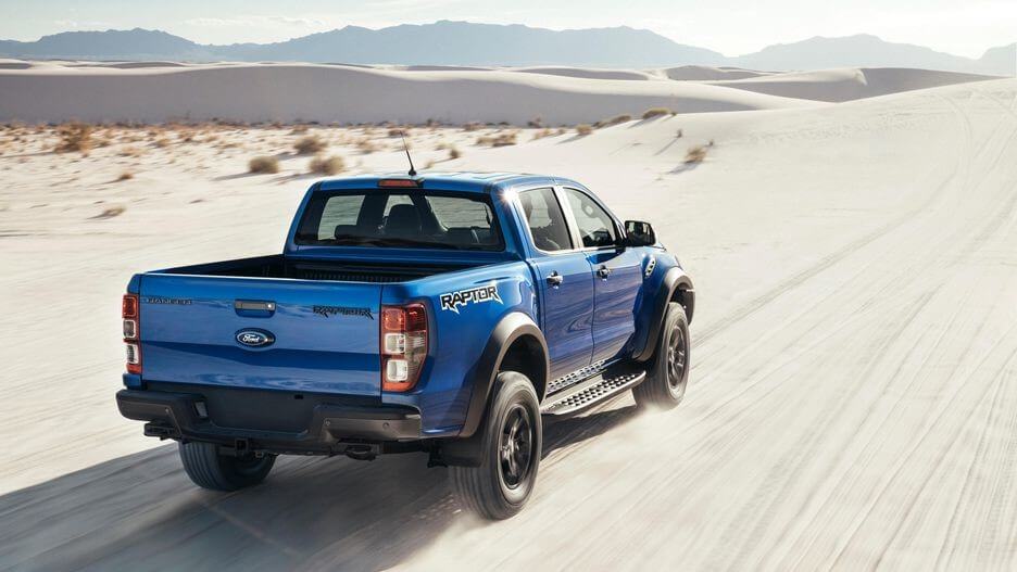 Backshot of a blue Ford Ranger Raptor