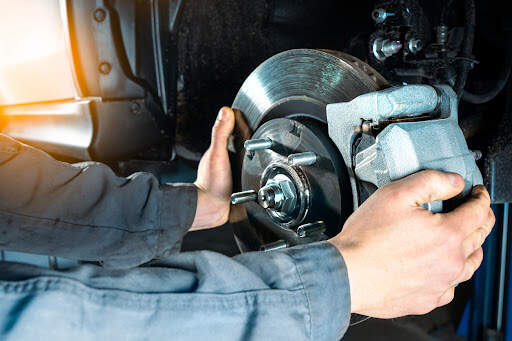 The brakes on your vehicle are an important part of its braking system. Checking the brake discs of a modern car.