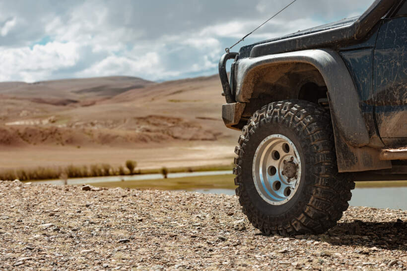 Close up of custom alloy wheel on a 4WD vehicle.