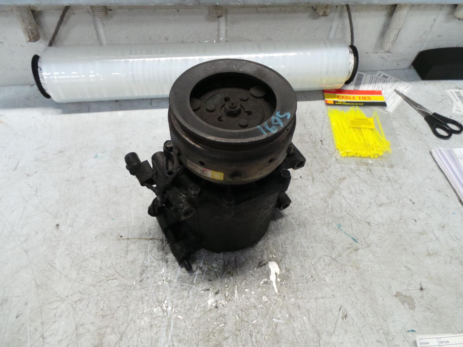 2003 Mitsubishi Triton A/C Compressor View Auto part A/C Compressor Mitsubishi Triton 2003