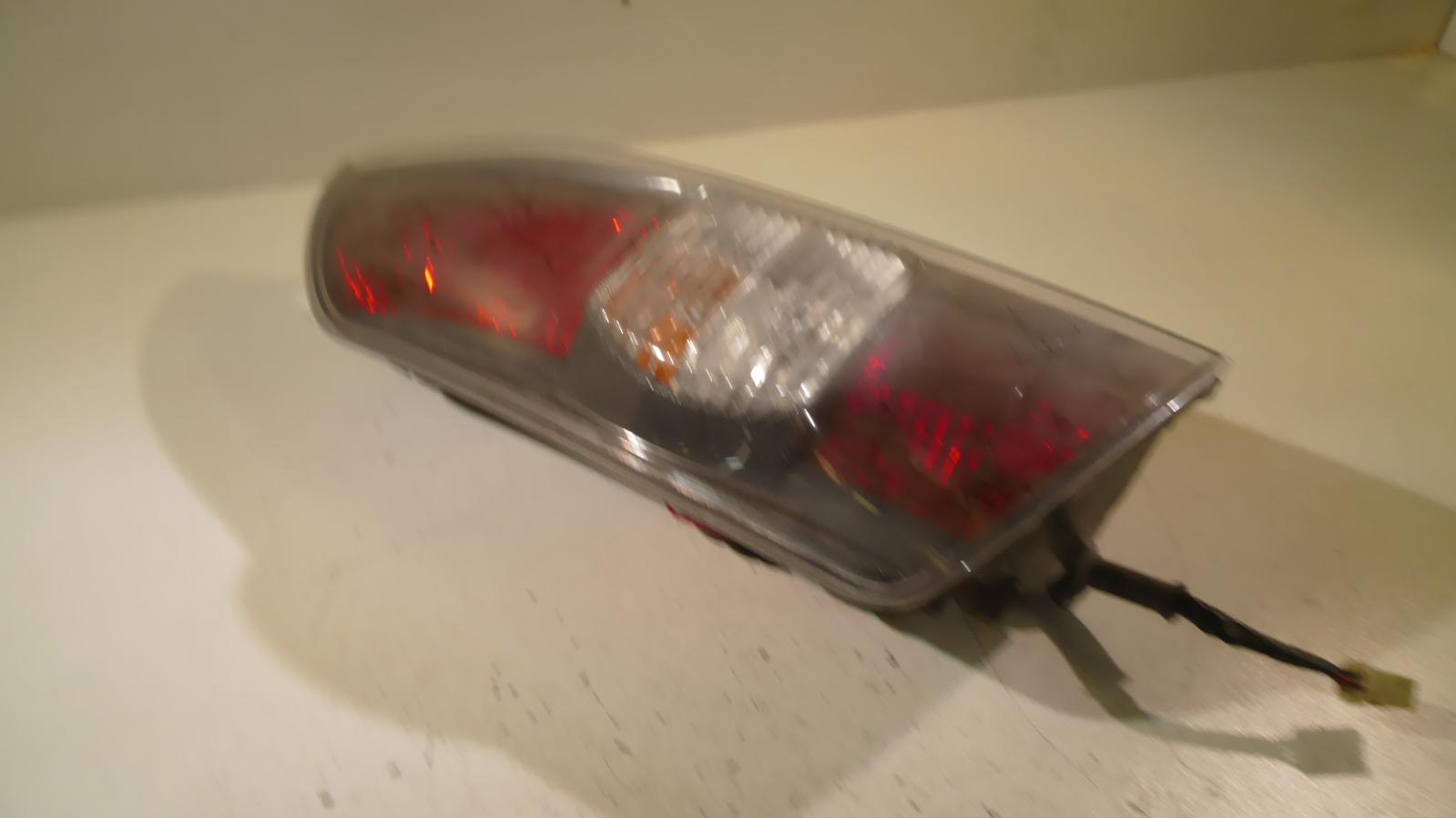 2006 Daihatsu Sirion Left Taillight View Auto part Left Taillight Daihatsu Sirion 2006