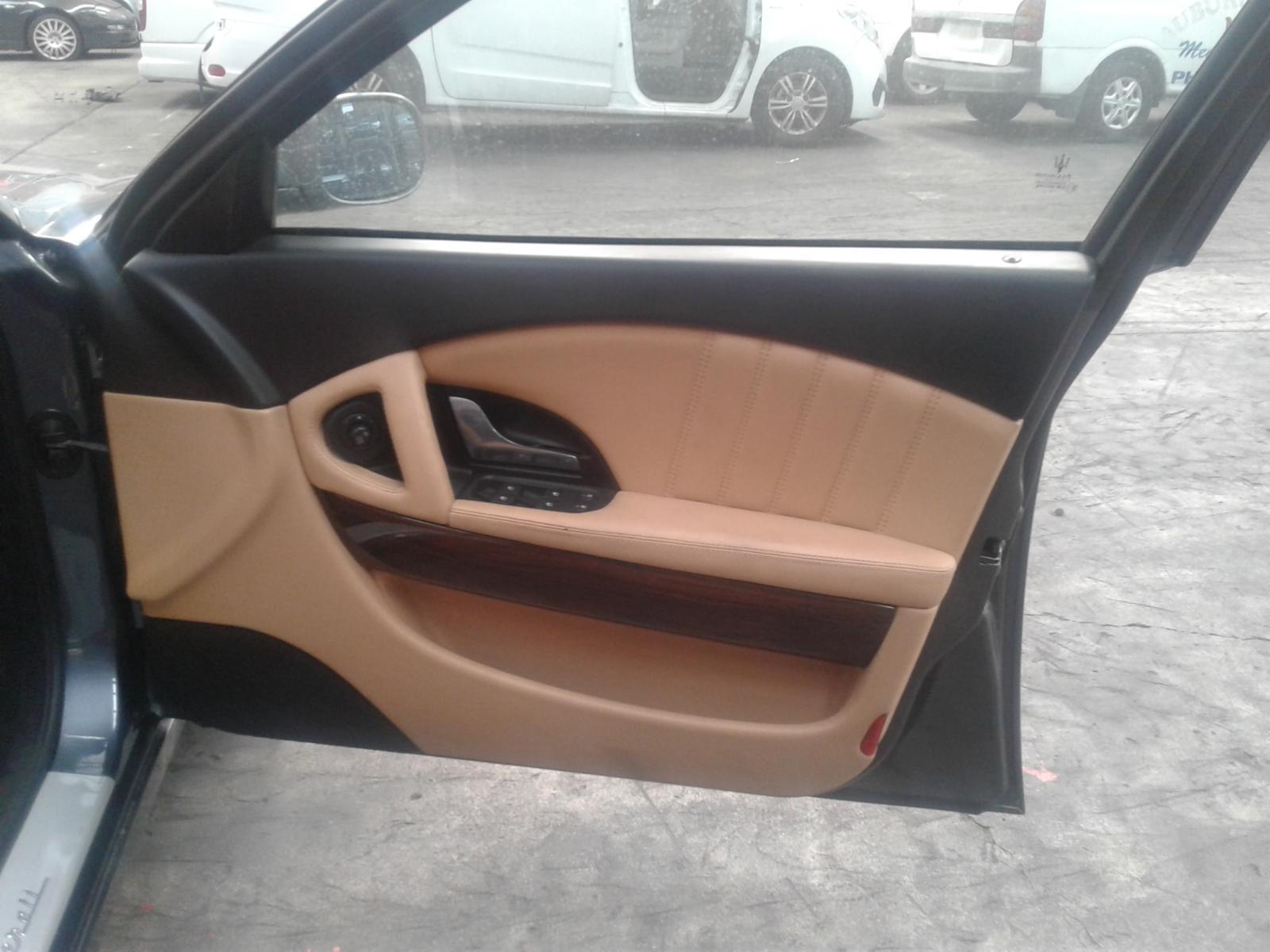 2004 Maserati Quattroporte Right Front Door View Auto part Right Front Door Maserati Quattroporte 2004