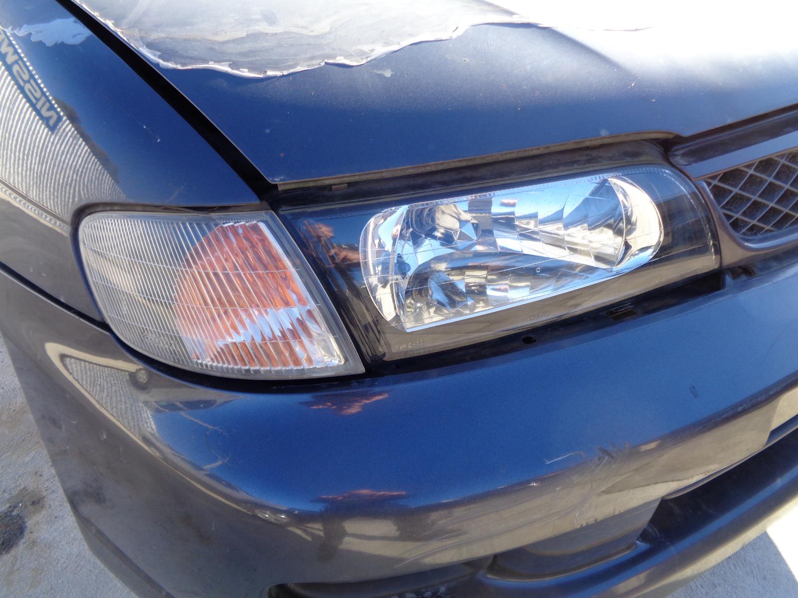 NISSAN PULSAR RIGHT HEADLIGHT N15, SSS TYPE, BLACK PLASTIC BACKING TYPE