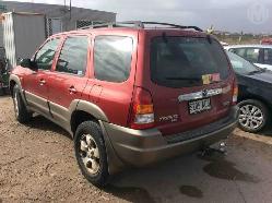 View Auto part Left Headlamp Mazda Tribute 2002