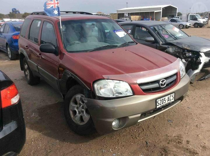 2002 Mazda Tribute Left Headlamp View Auto part Left Headlamp Mazda Tribute 2002