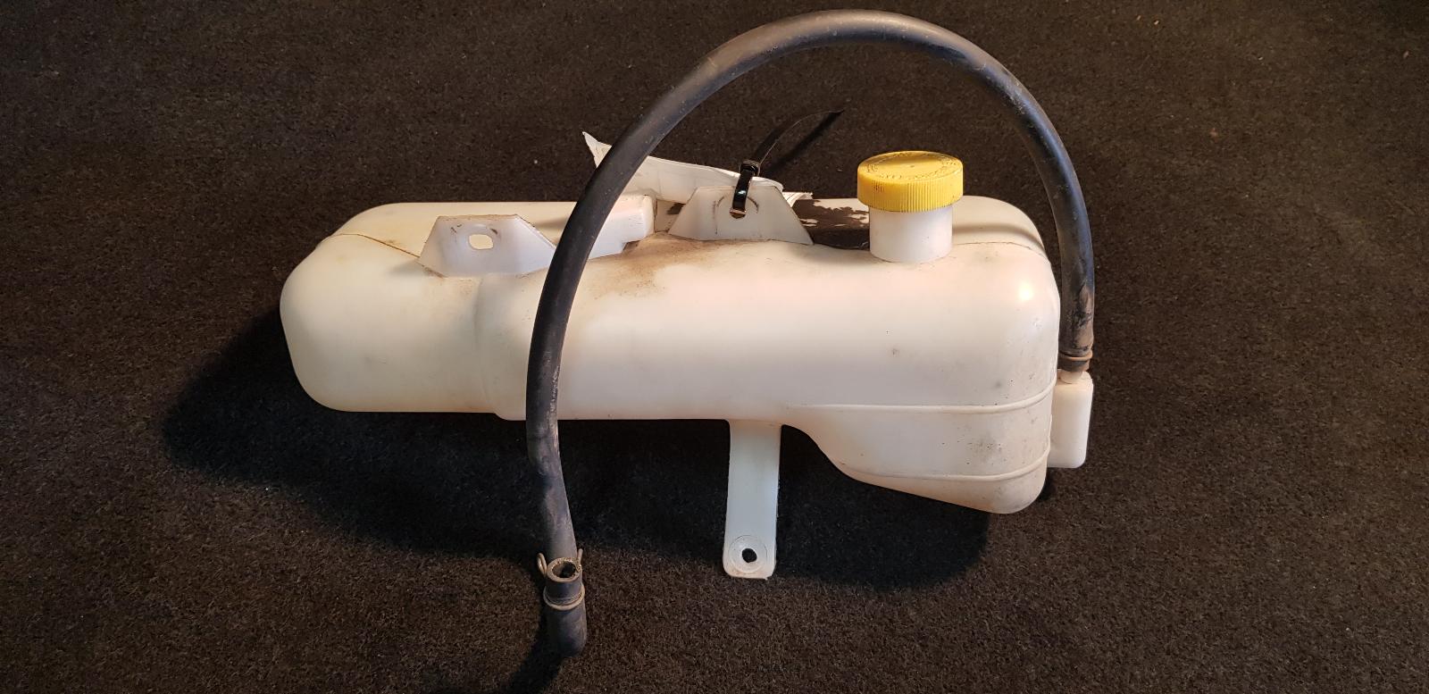 View Auto part Overflow Bottle Nissan Patrol 1998