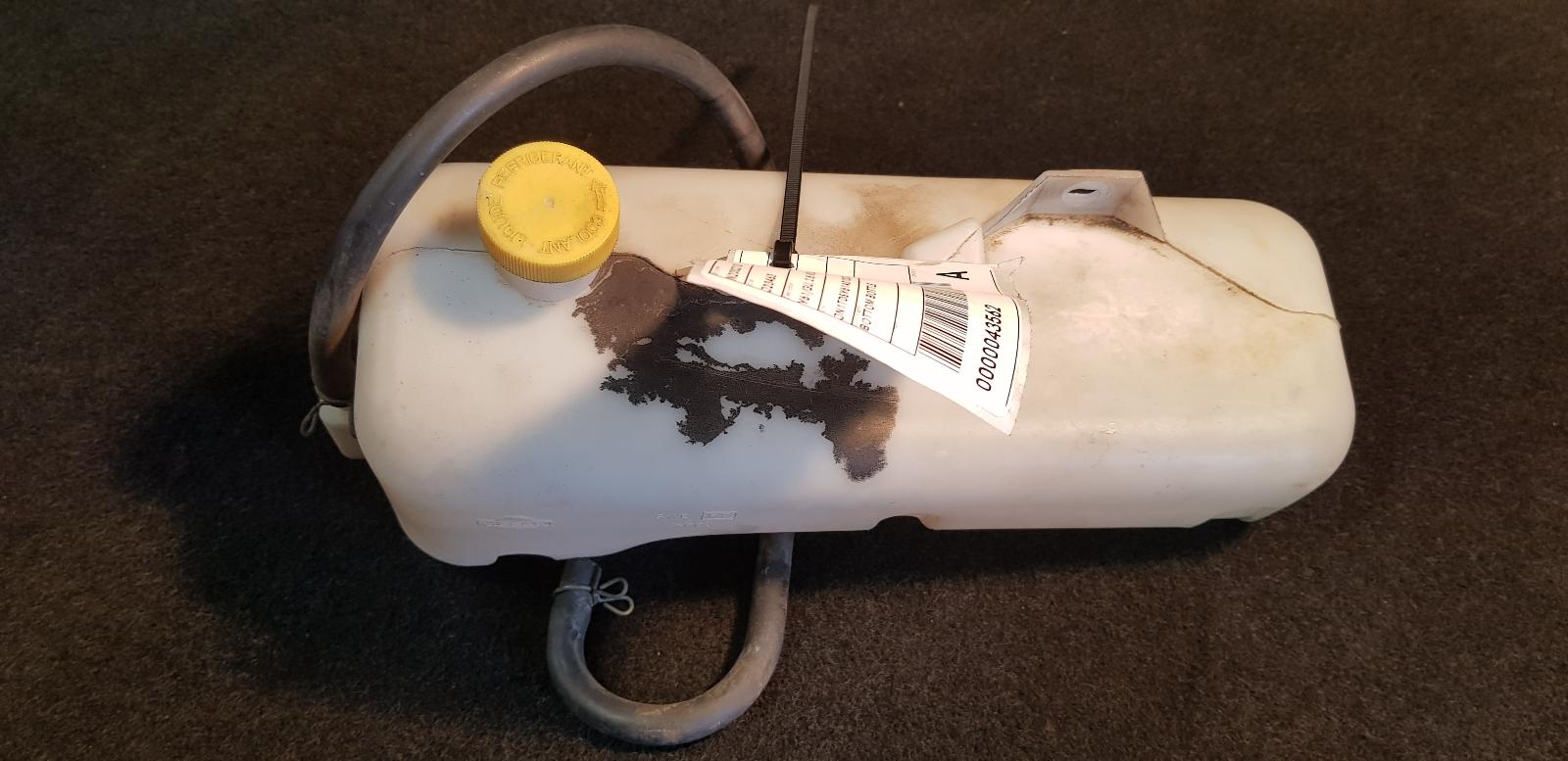 View Auto part Overflow Bottle Nissan Patrol 1998