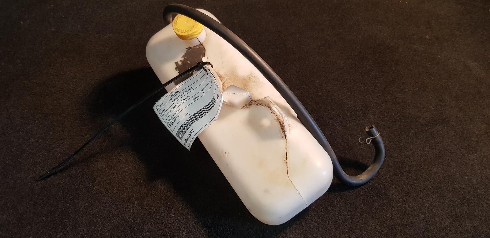 View Auto part Overflow Bottle Nissan Patrol 1998