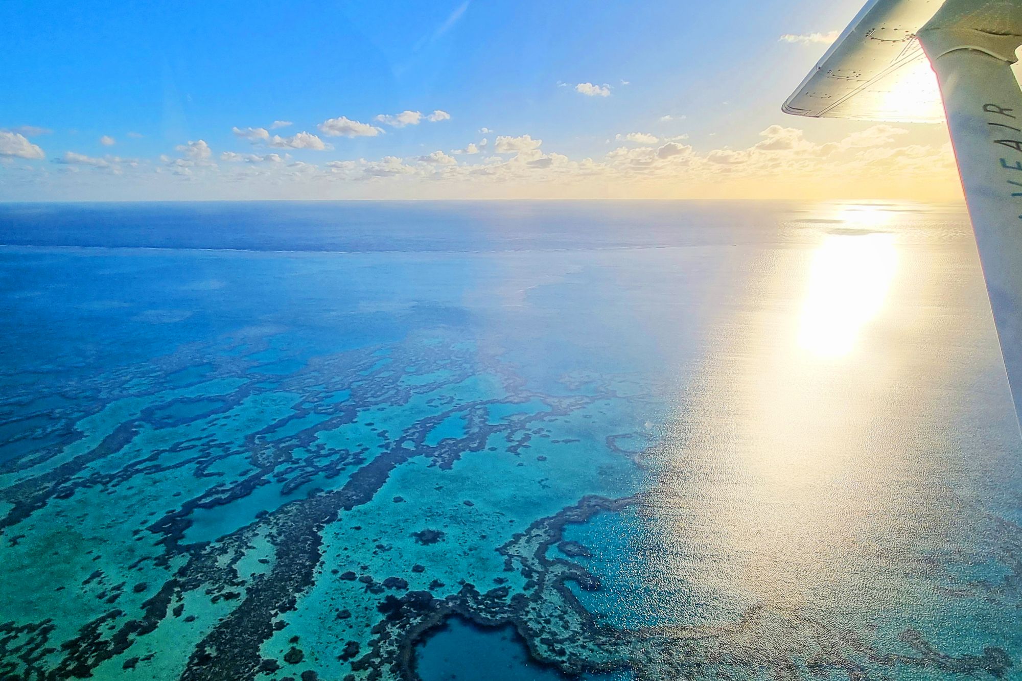 Flying over the Great Barrier Reef on a scenic flight, Flying over the Great Barrier Reef on a scenic flight,