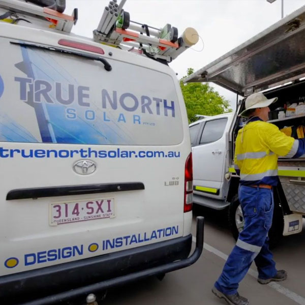 True North Solar Installer in front of van