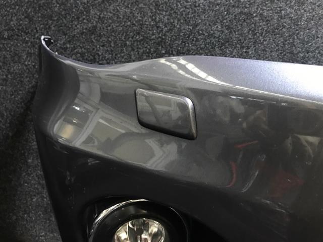 R Headlight Washer Jet