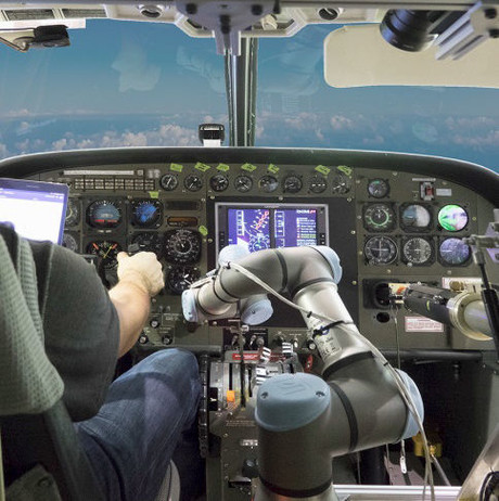 Robot flies a Cessna Aurora robot