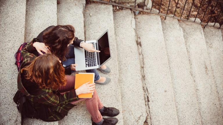 find their spark - friends using computer