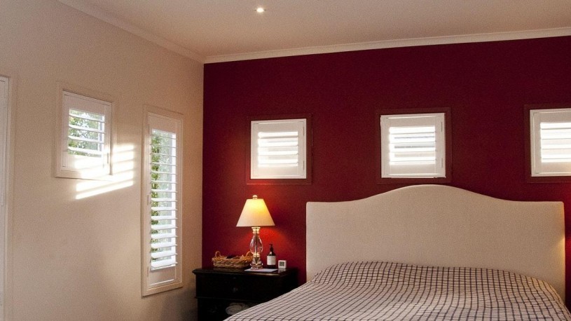 Various Custom Sized Window Plantation Shutters Installed in Master Bedroom