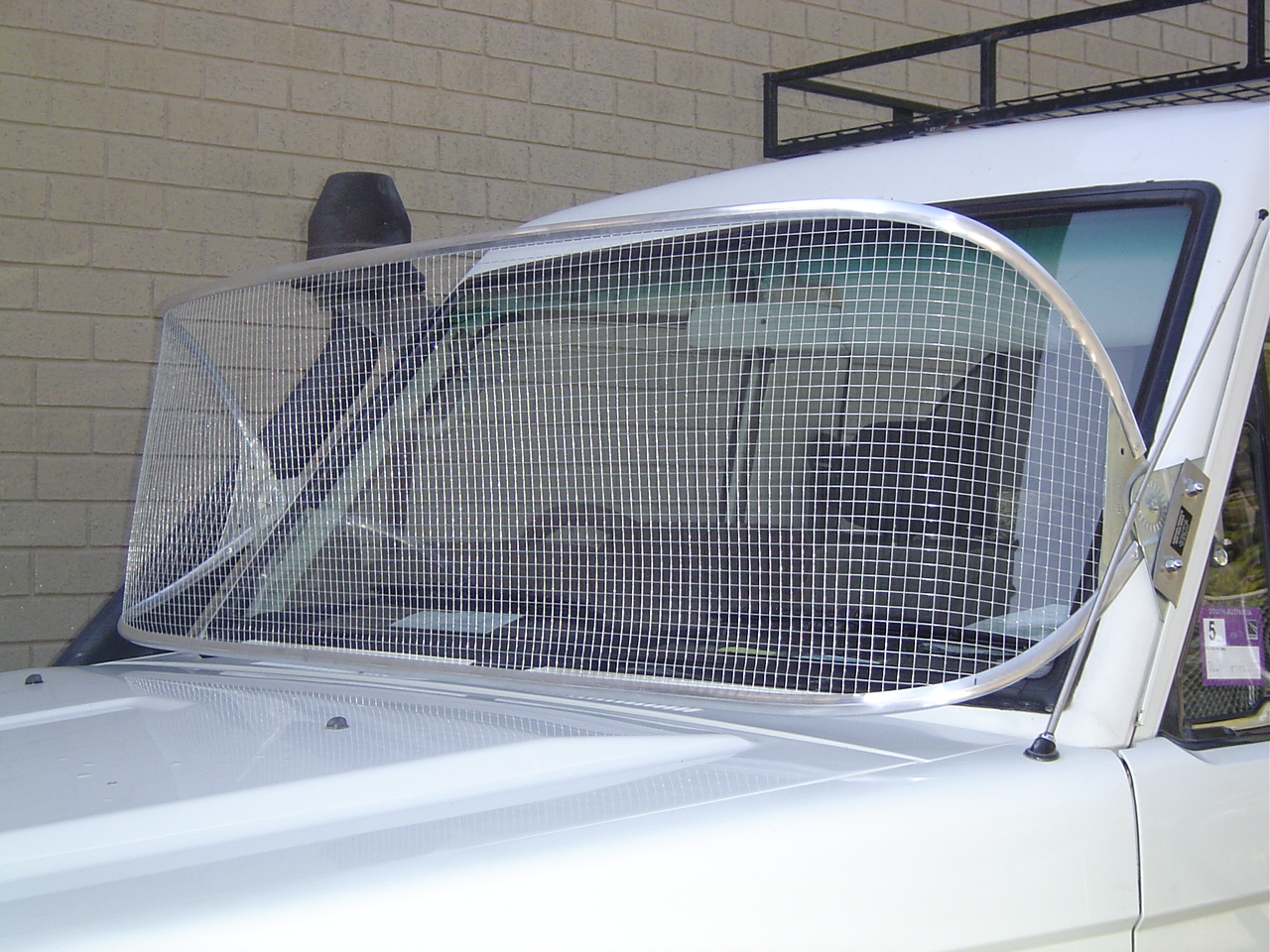 Stone Guard Toyota 80 Series L/Cruiser Silver 450mm Windscreen