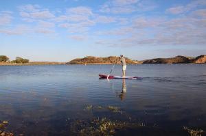 Go to SUPing at Lake Moondara, Mount Isa QLD