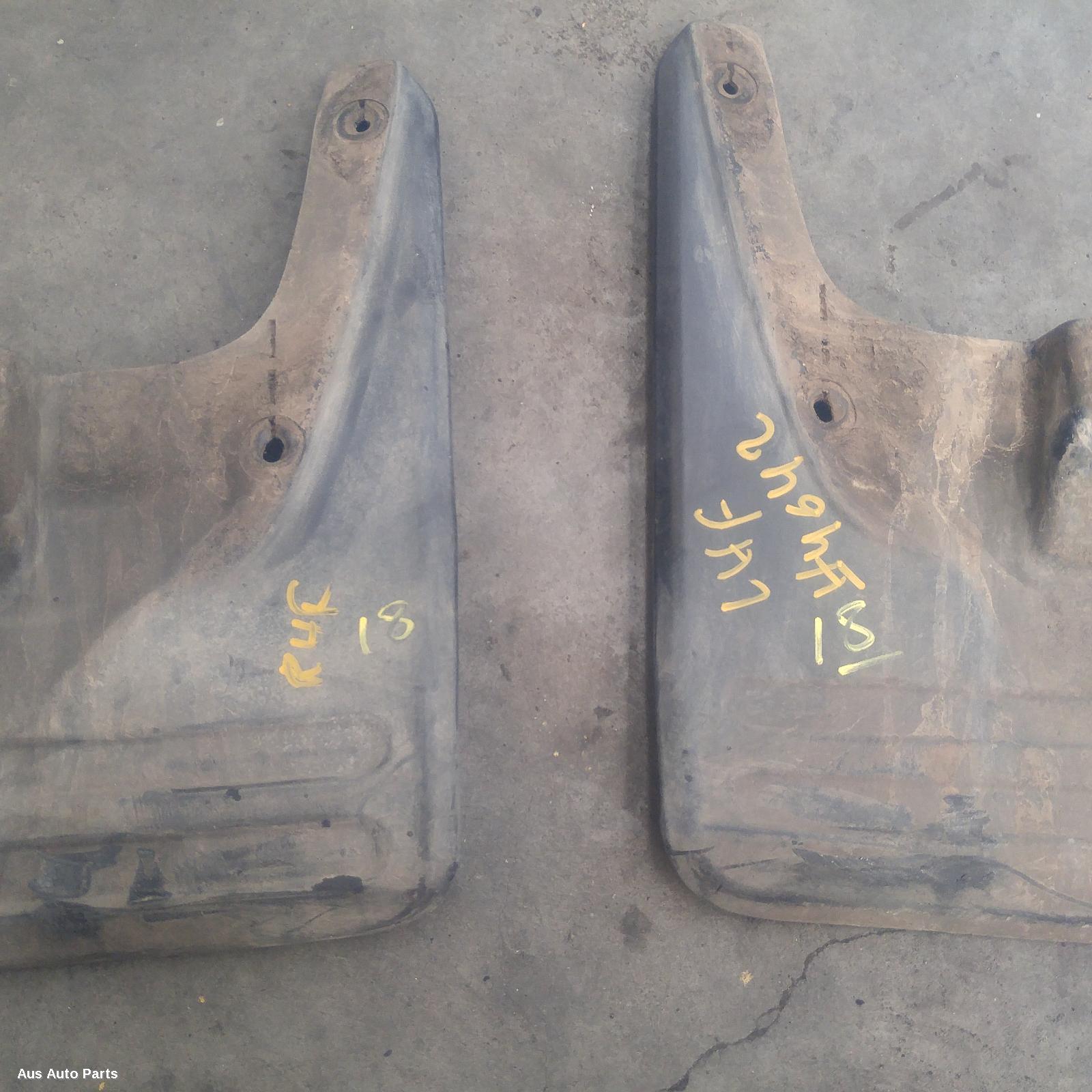 103257, Used mud flaps for 2006 hilux rh front, 4wd, non flared type