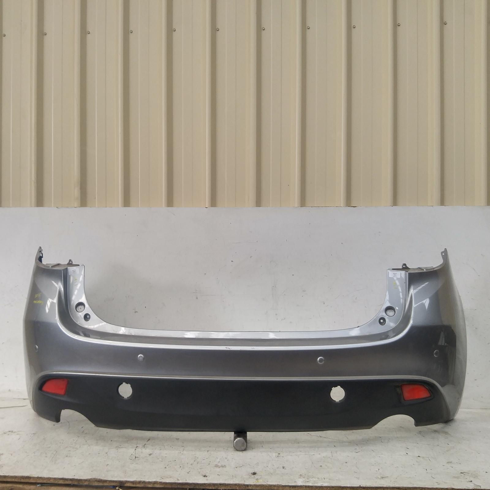143969, Used bumper rear for 2015 3 bm, hatch, petrol, w/ park sensor