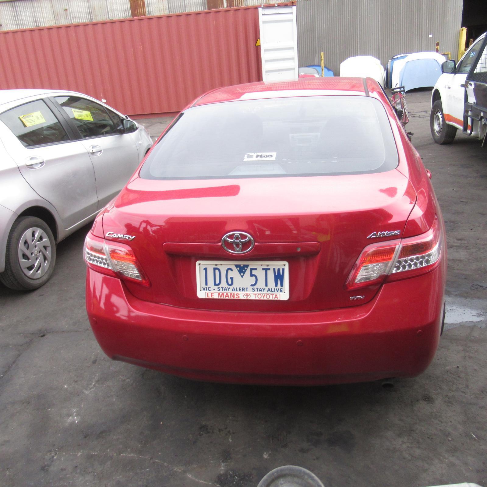 157327, Used bumper rear for 2011 Camry acv40, non spoiler, w/ park