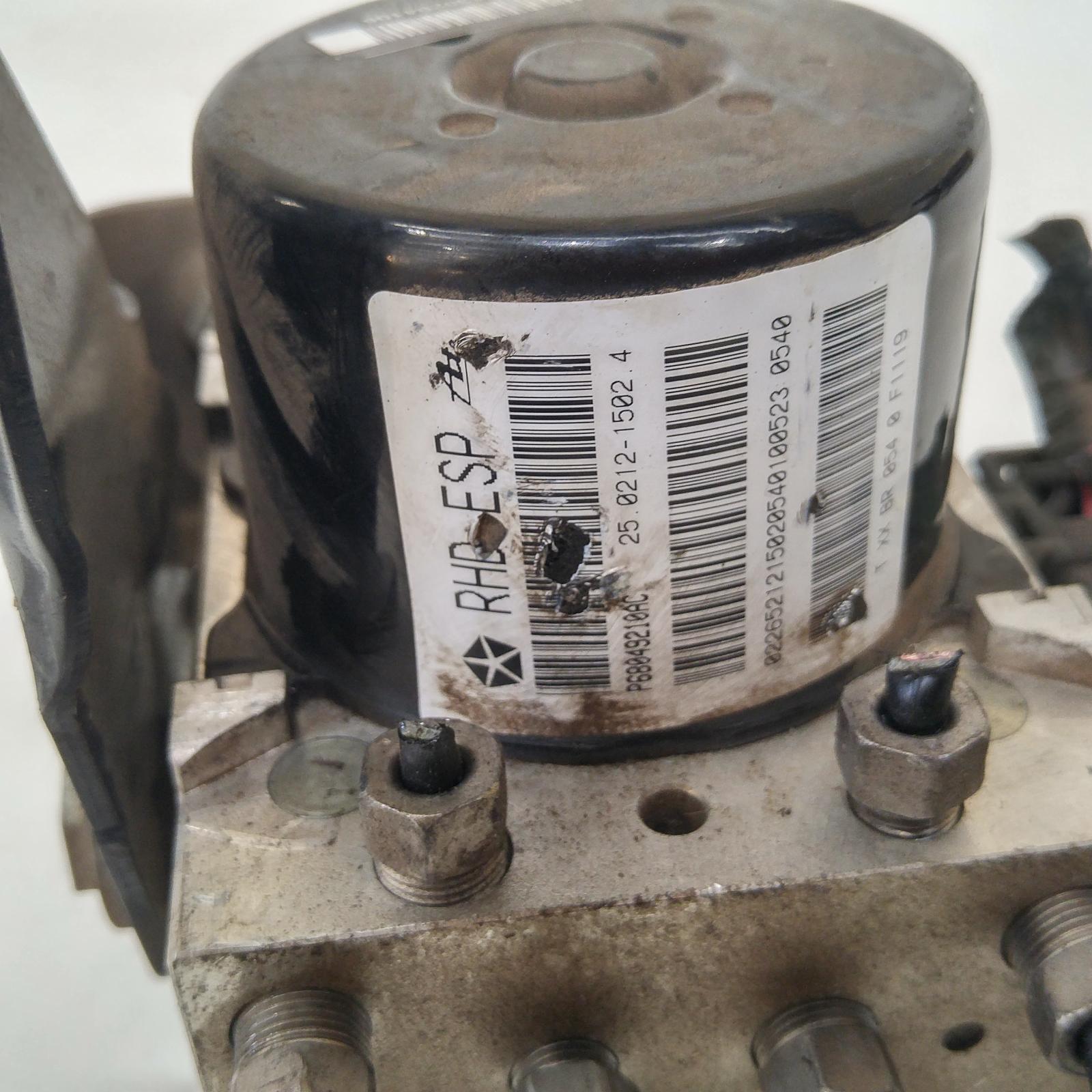 209682, Used abs pump/modulator for 2010 Patriot p/n p68049210ac, mk