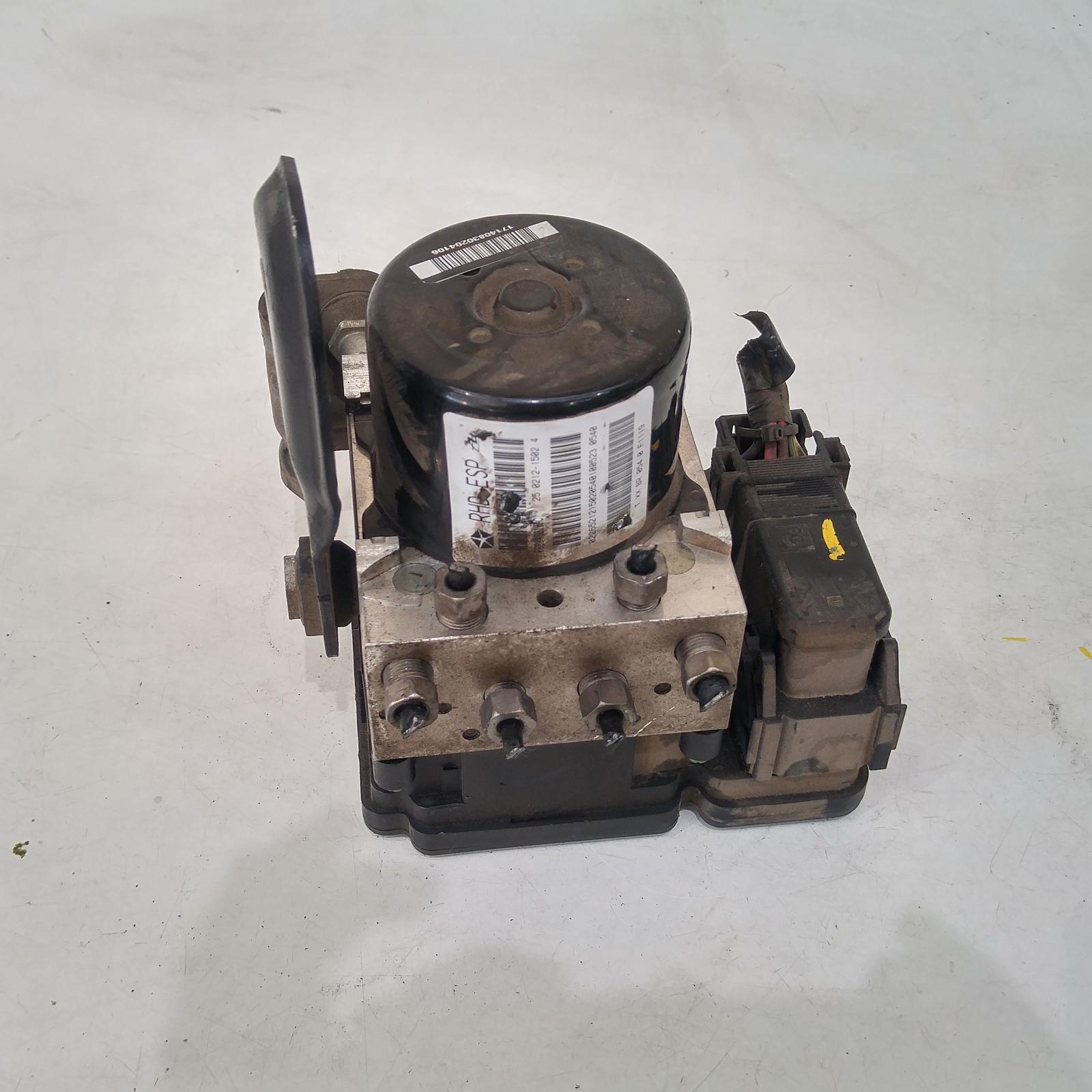 209682, Used abs pump/modulator for 2010 Patriot p/n p68049210ac, mk