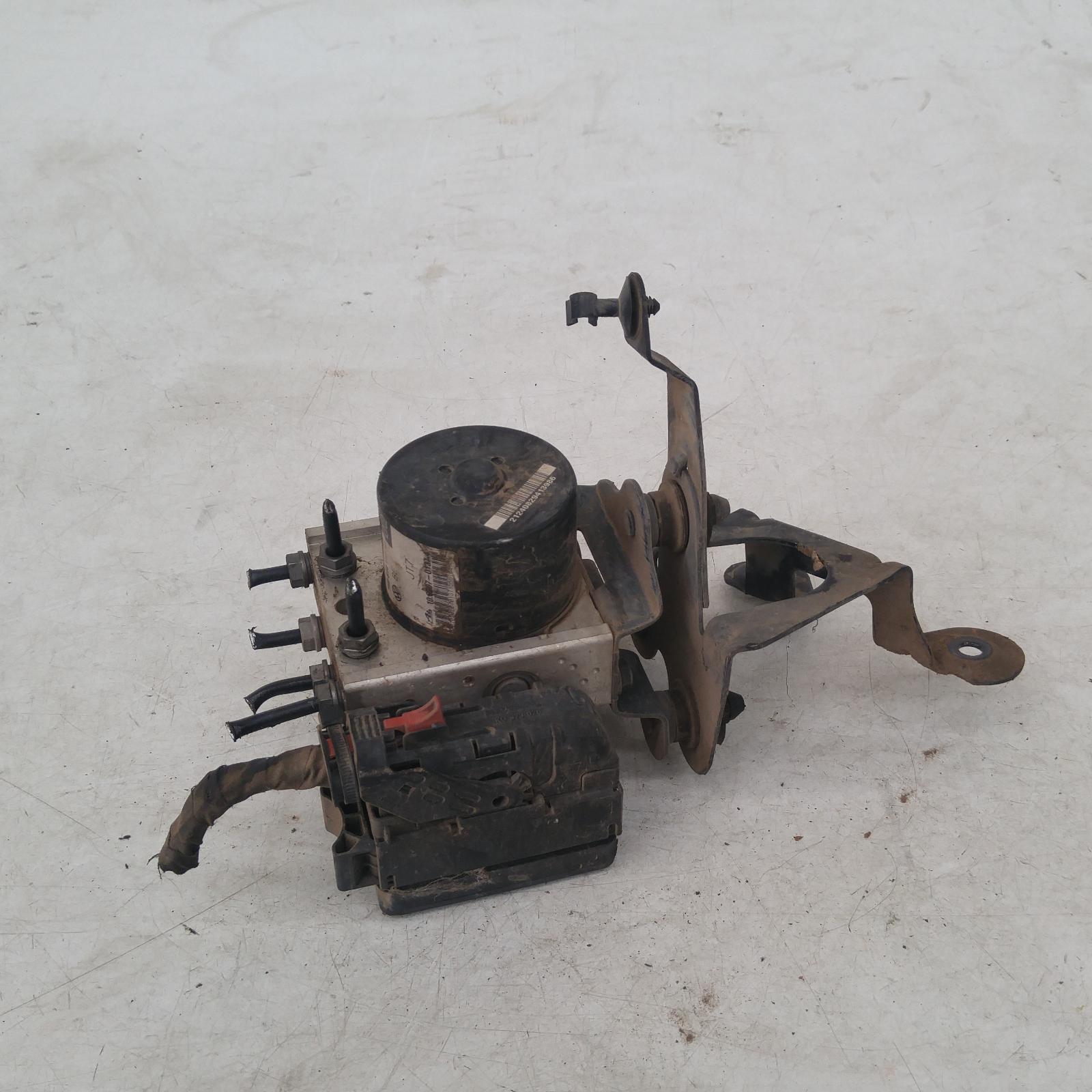 #227986, Used abs pump/modulator for 2008 Caddy| 2k, on motor p/n ...