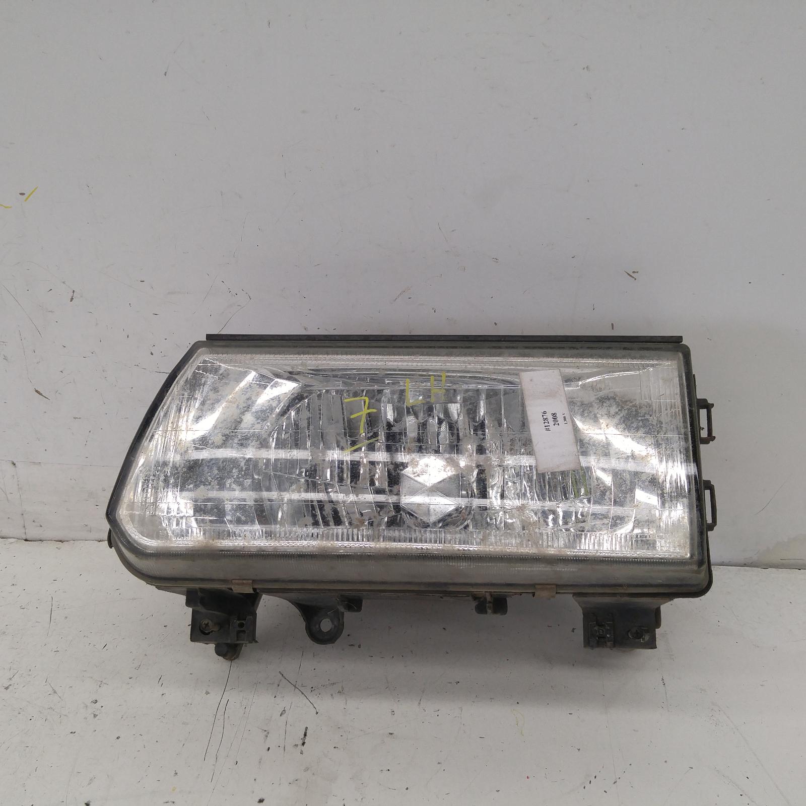 L300 Headlamp Left 1999-2013 sj/sk,express,09/99-12/13 00012876 #297519
