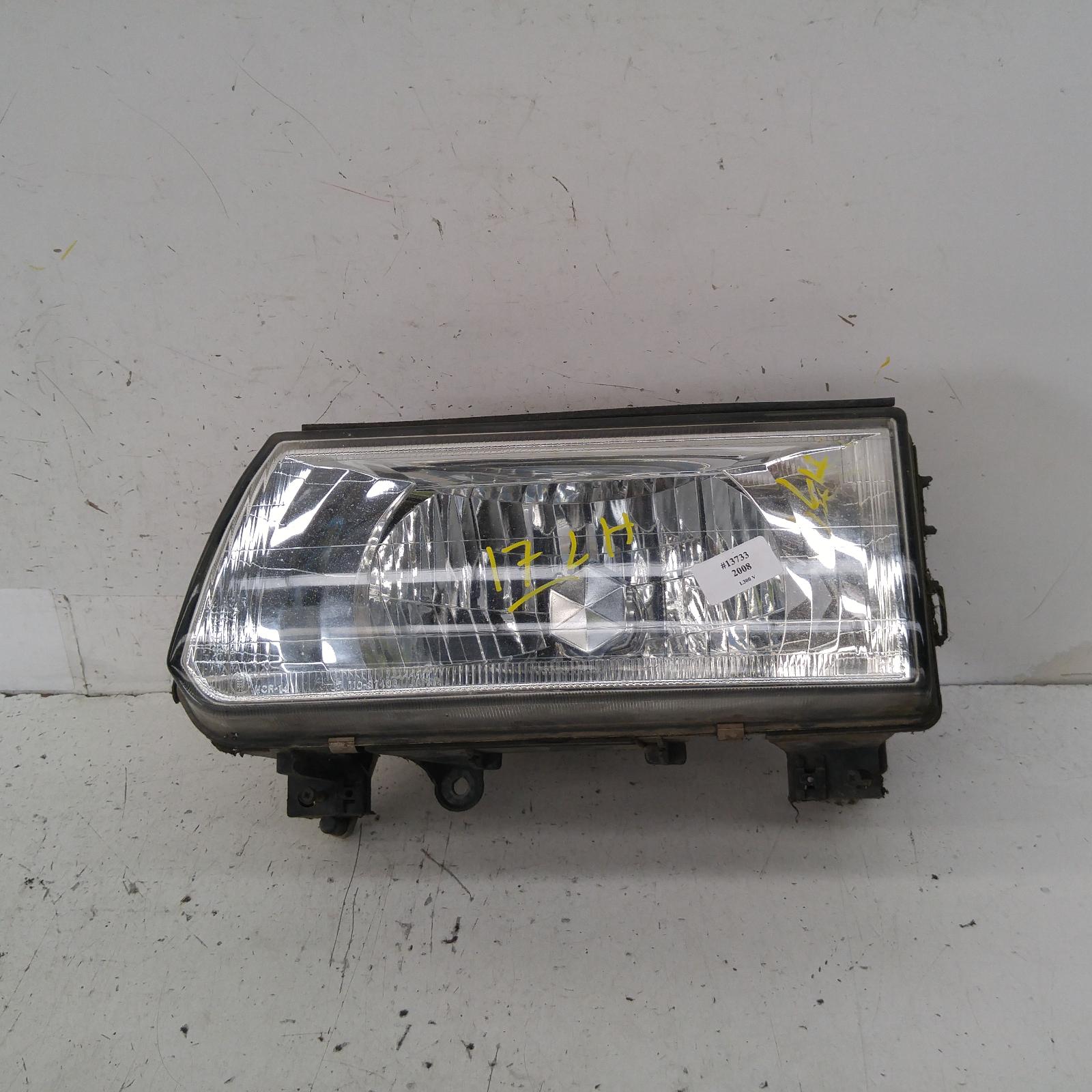 L300 Headlamp Left 1999-2013 sj/sk,express,09/99-12/13 00013733 #319041