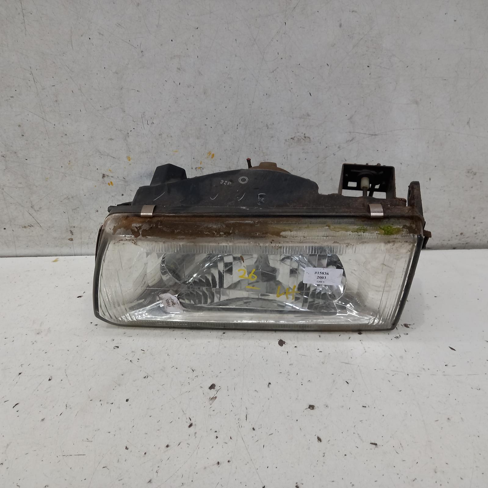 L300 Headlamp Left 1999-2013 sj/sk,express,09/99-12/13 00015836 #389640
