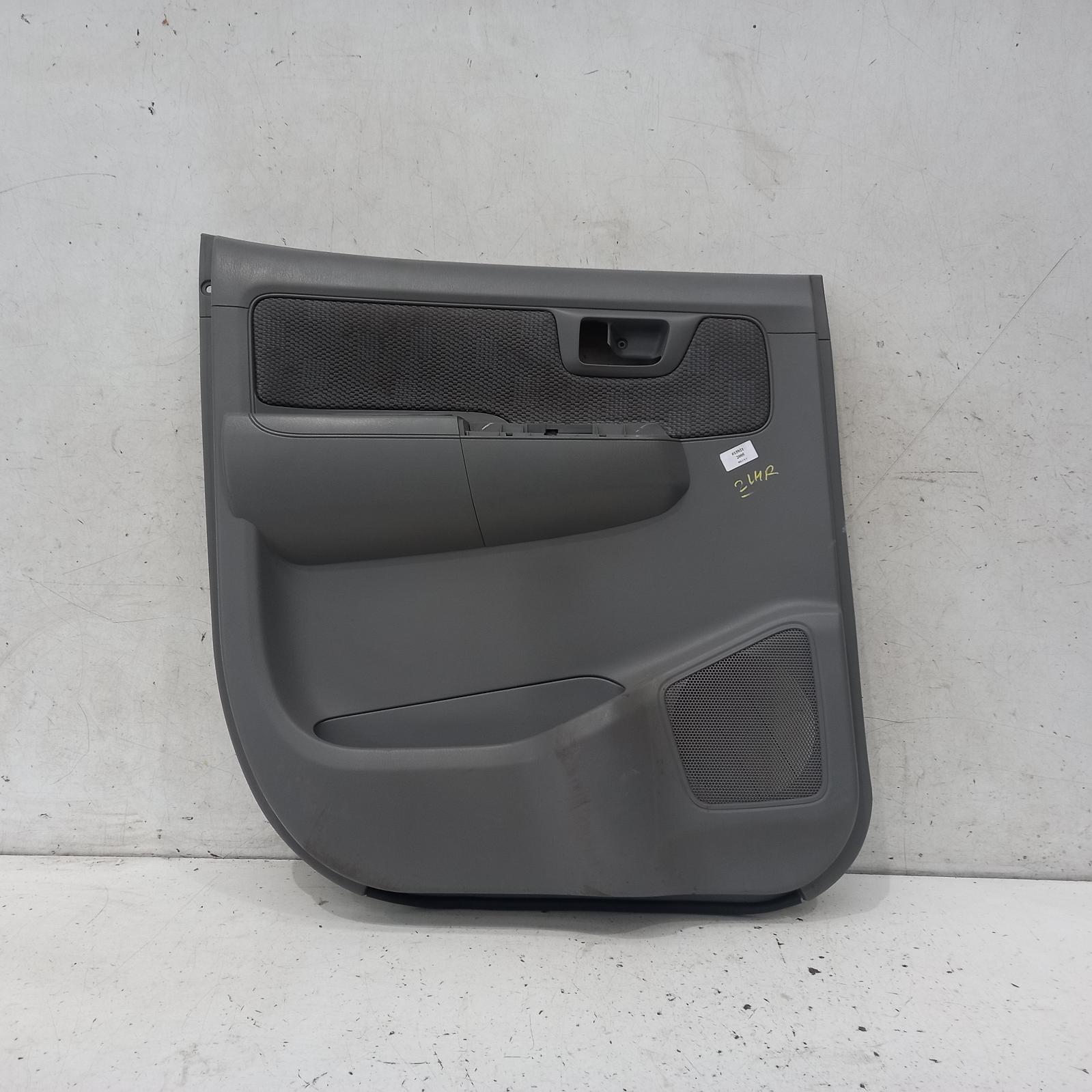 Hilux Door Trim 2005-2011 lh rear,dual cab,power windows,light grey plastic,w/cloth insert type,03/05-06/11 00015921 #393393