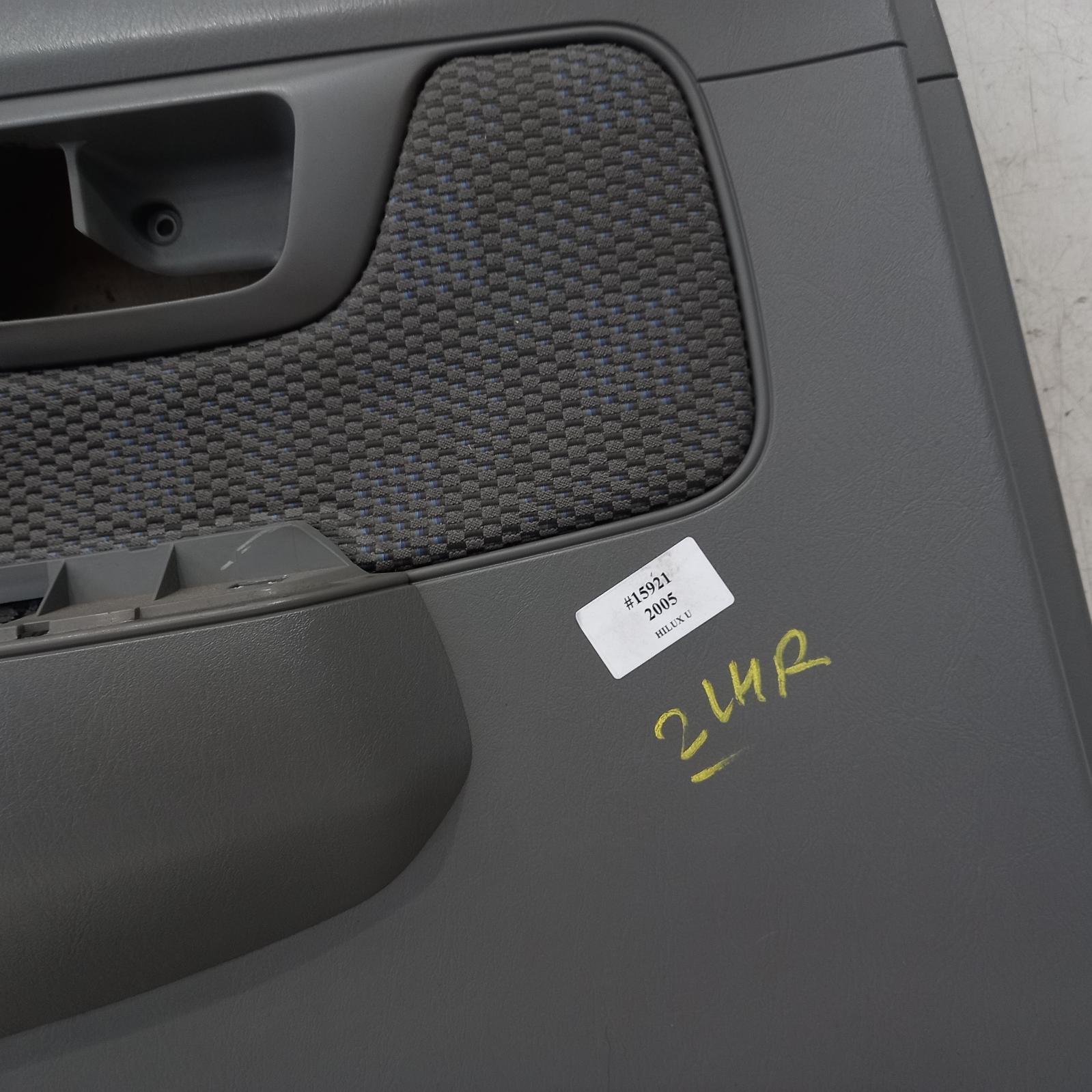 Hilux Door Trim 2005-2011 lh rear,dual cab,power windows,light grey plastic,w/cloth insert type,03/05-06/11 00015921 #393393