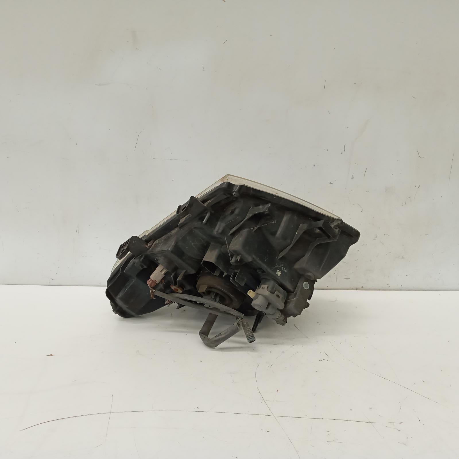 Navara Headlamp Left 2005-2015 d40 (vin mnt),09/05-08/15 00014081 #472817