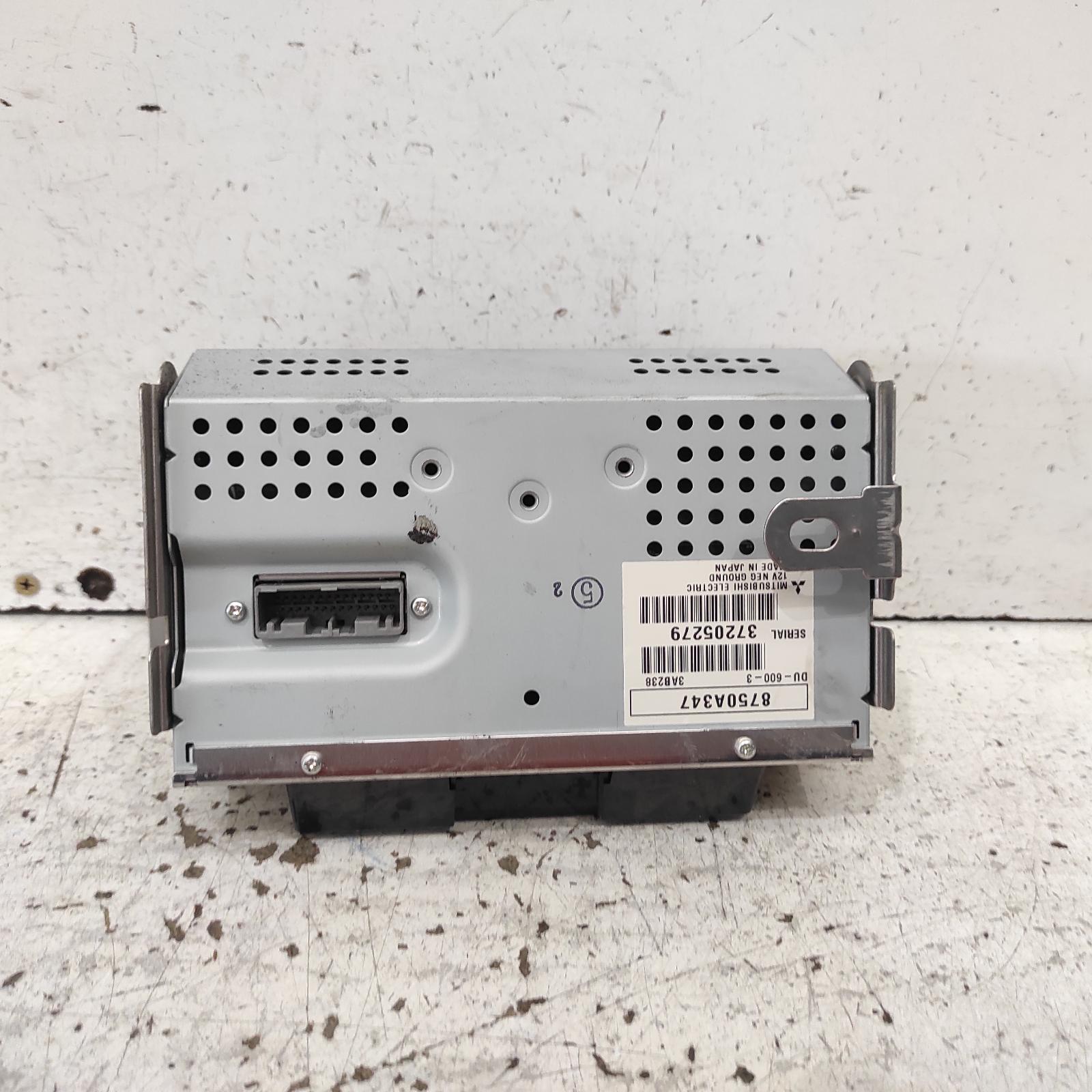 Triton Clock 2009-2015 centre dash,black buttons type,mn,08/09-04/15 00021673 #672306
