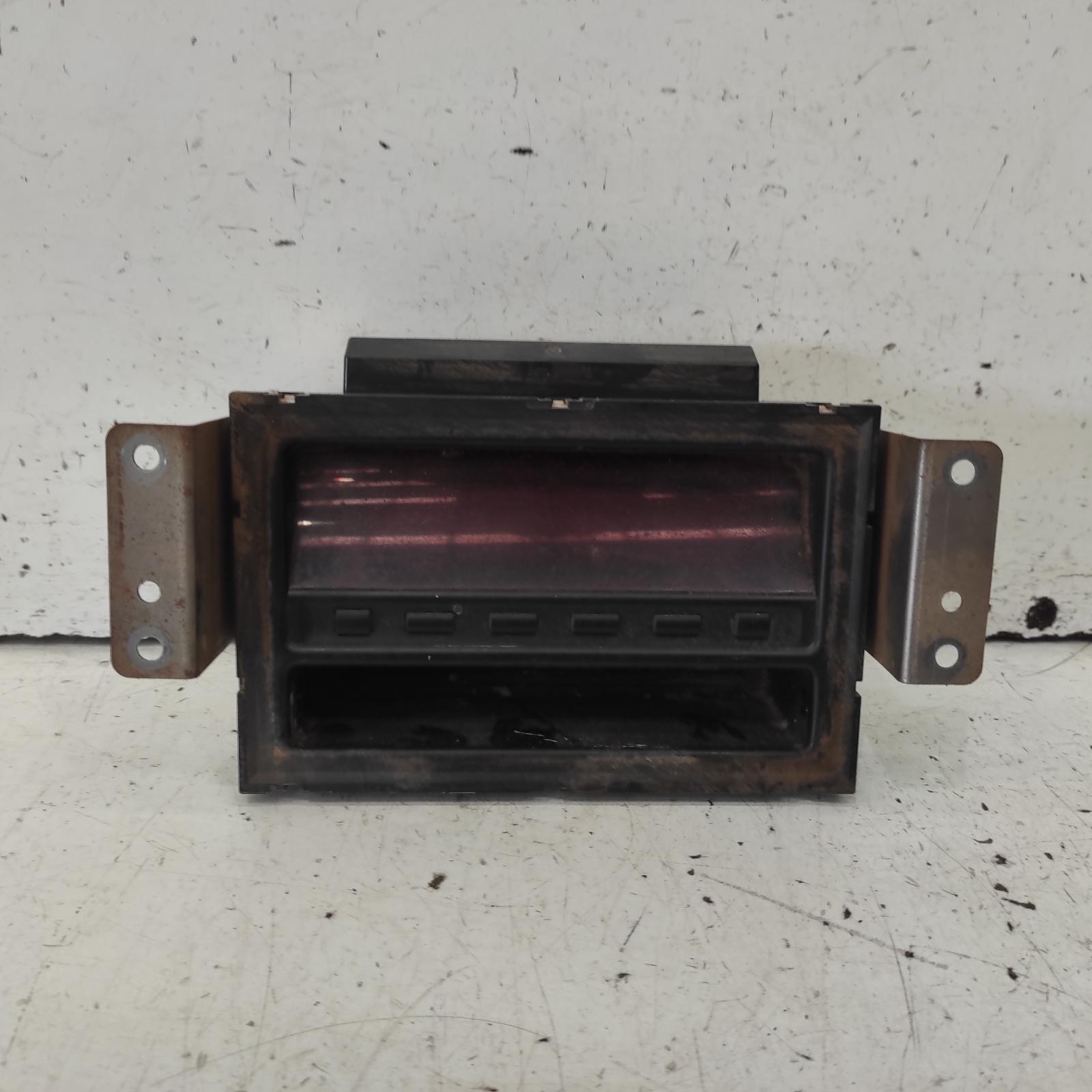 Triton Clock 2009-2015 centre dash,black buttons type,mn,08/09-04/15 00021818 #678758