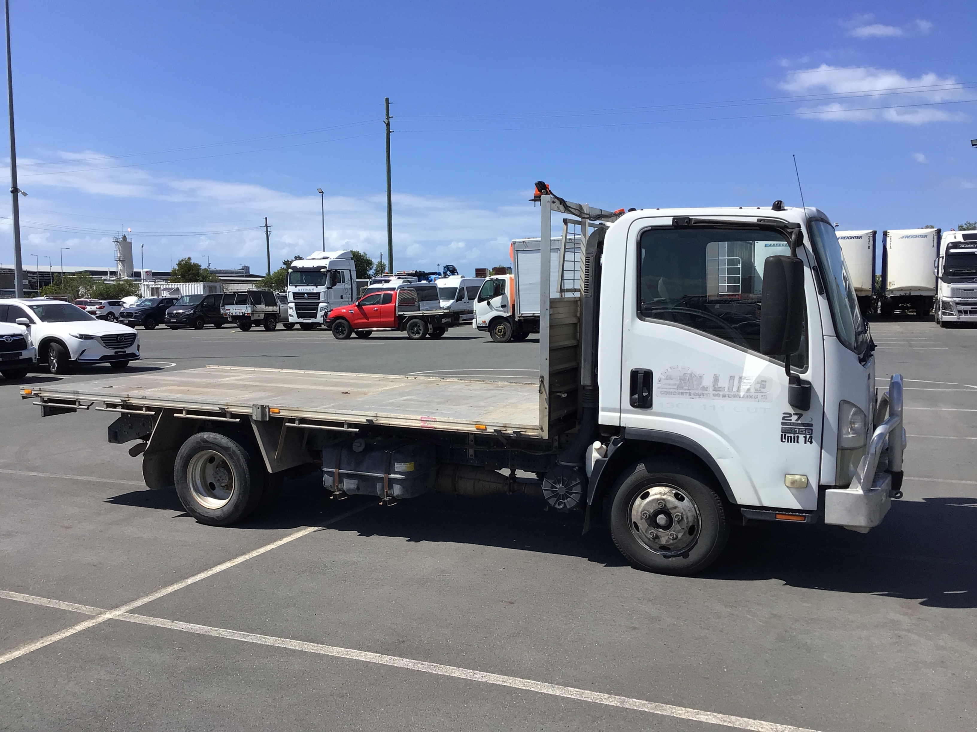 4 · 2012 Isuzu NPR 4x2 Tray Truck