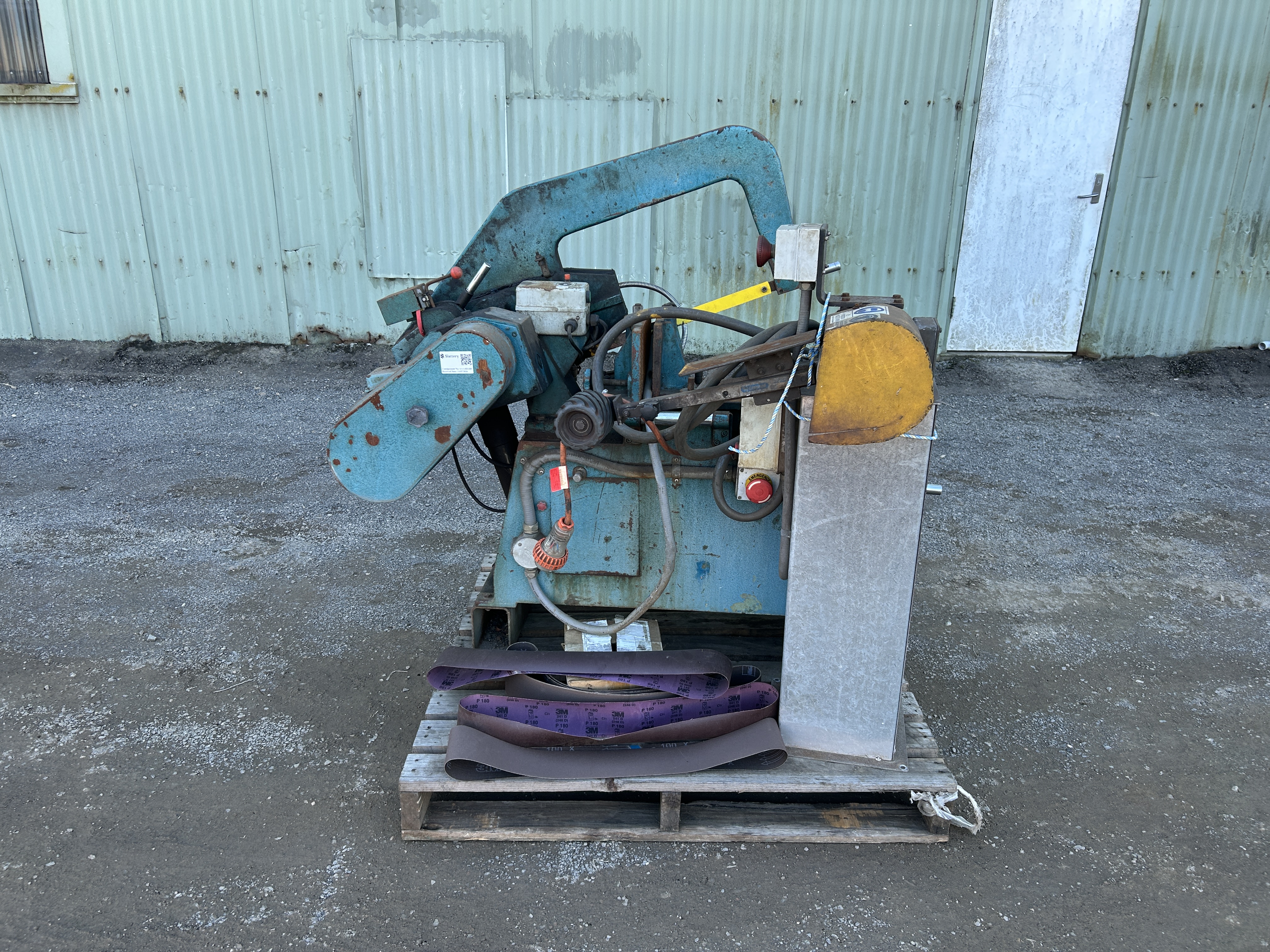 205 · Parkanson metal bandsaw and a belt grinder