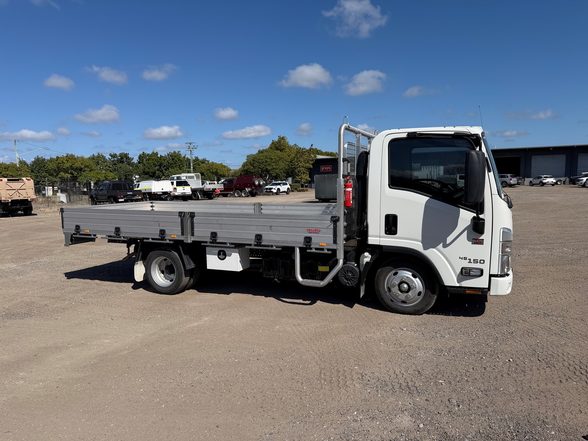 6 · 2024 Isuzu NLR 45-150 AMT Traypack   4x2 Tray Truck