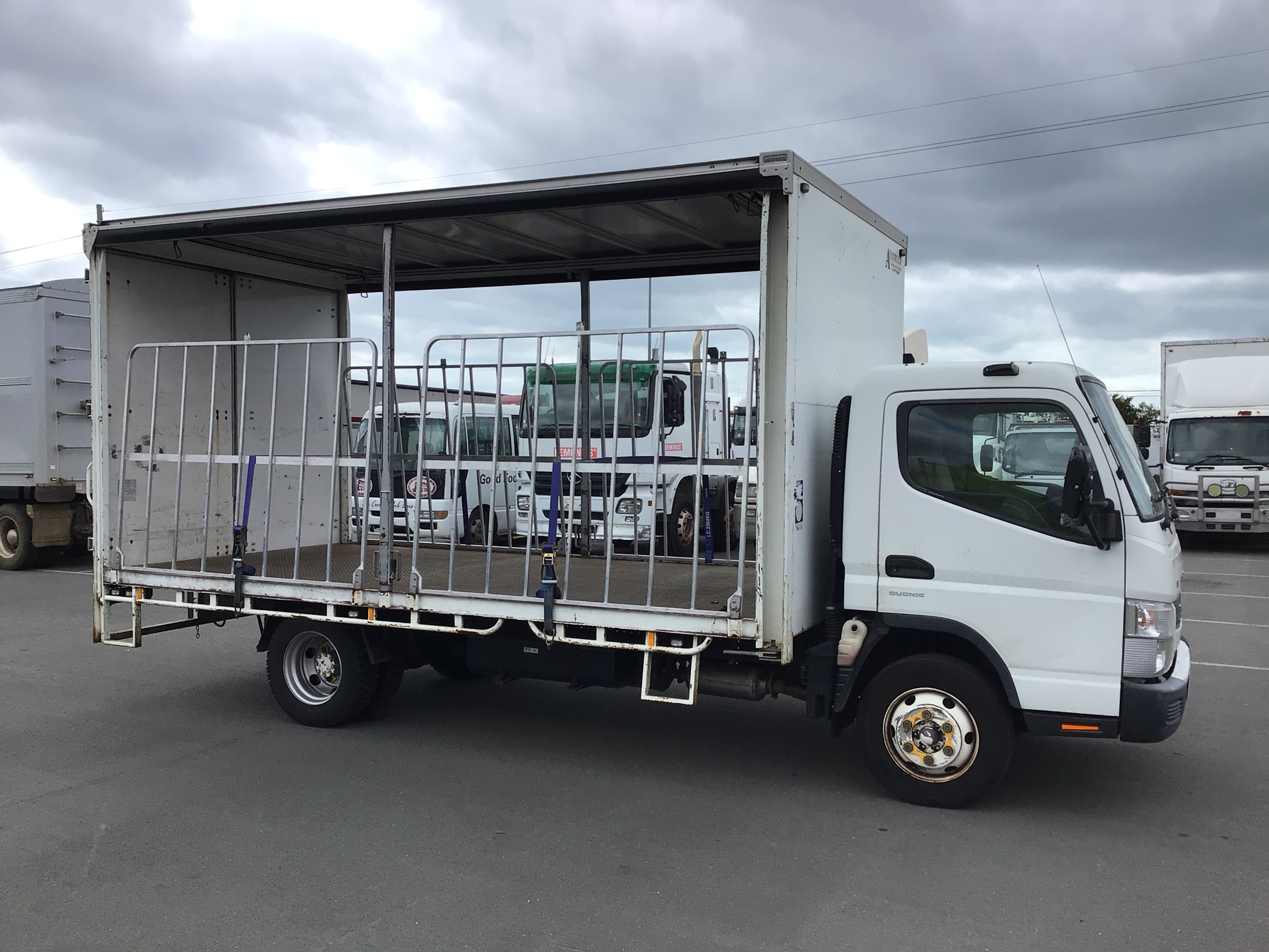 13 · 2016 Mitsubishi Fuso 4x2 Curtainsider