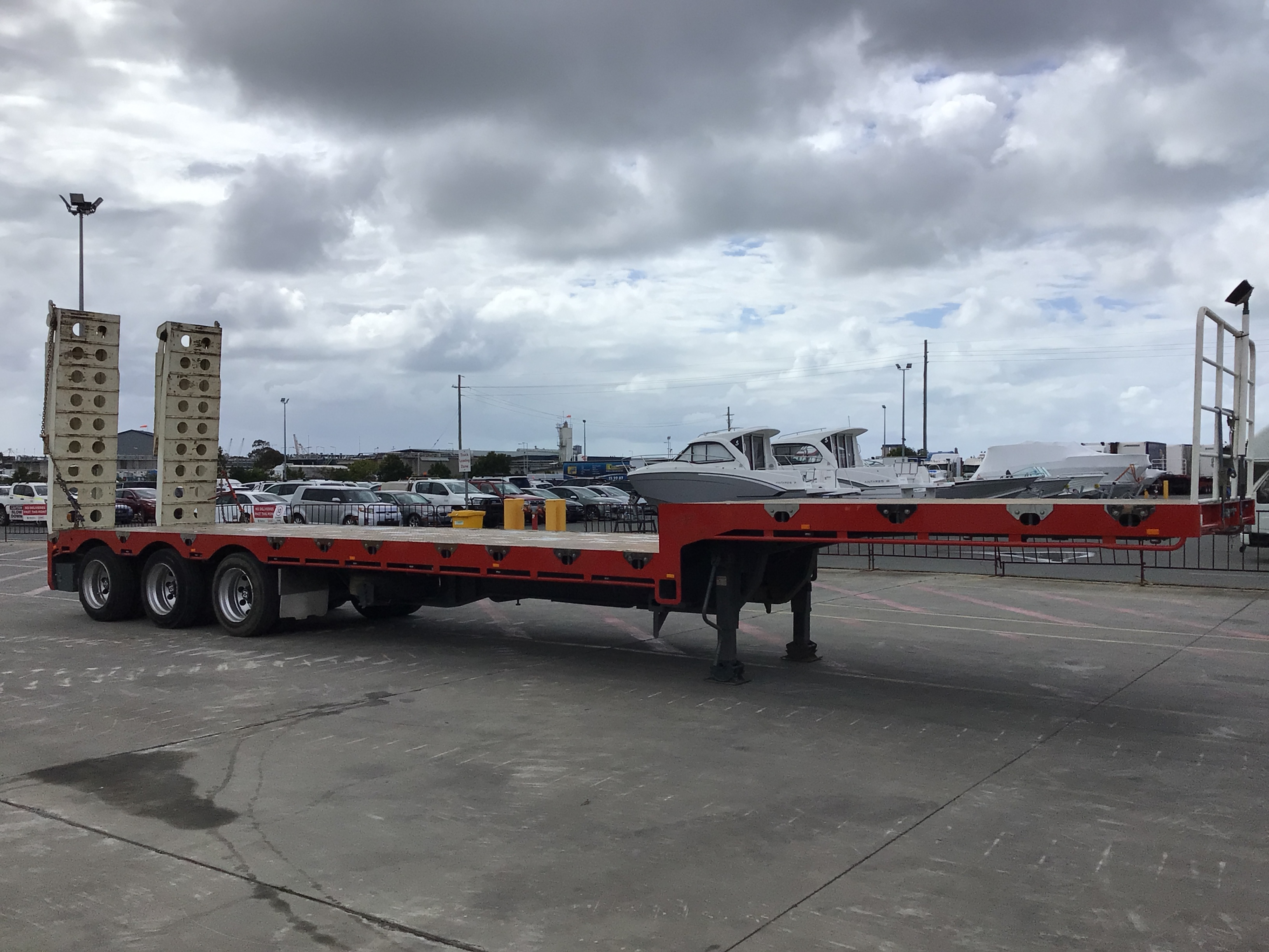 17 · 2025 AAA Trailers M45FTADDR Tri-Axle Step Deck Trailer W/ Motorised Ramps