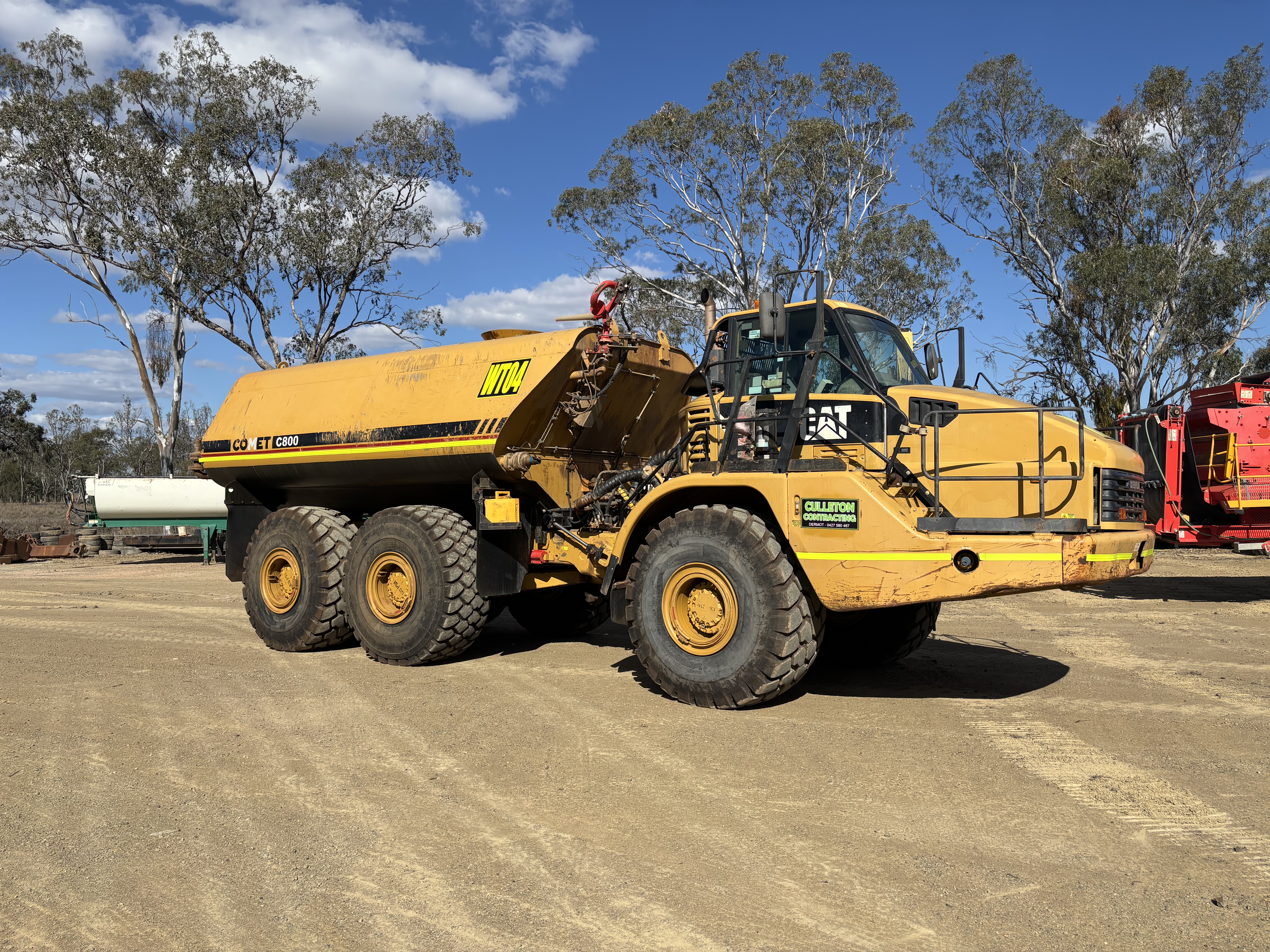 13 · 2010 Caterpillar 740 6x6 Articulated Water Cart