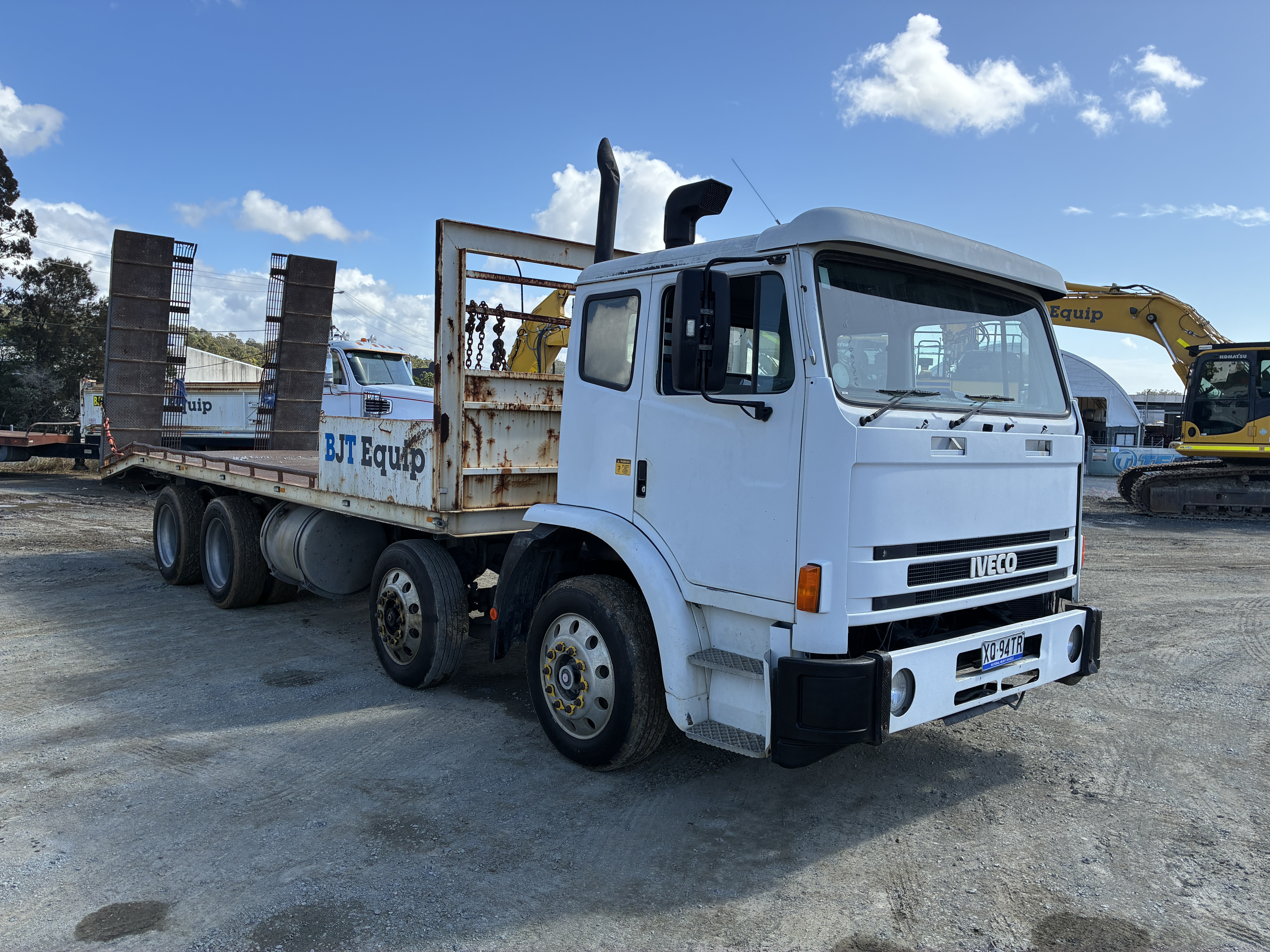 18 · 2002 Iveco Acco    8x4 Beavertail