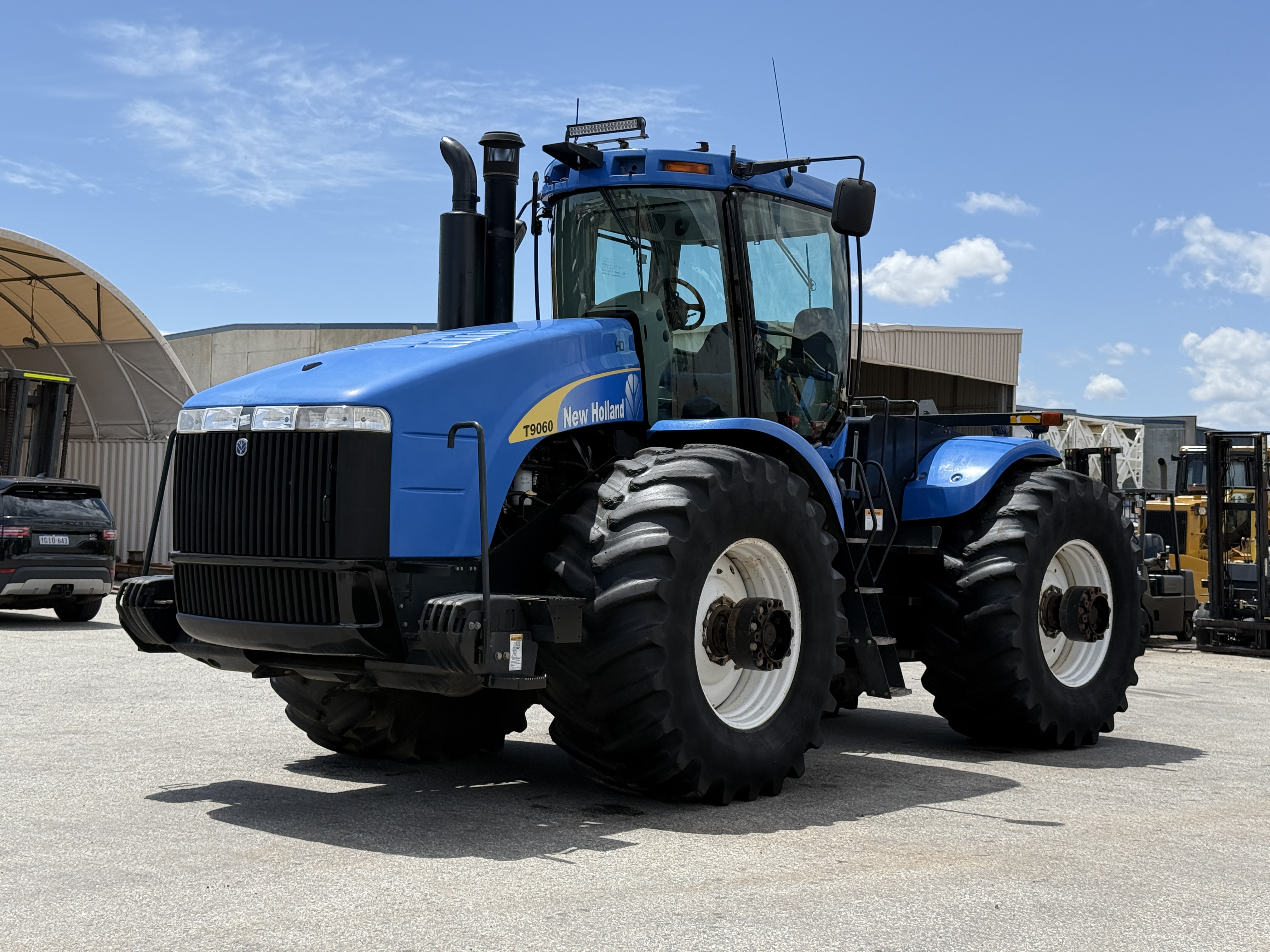 3 · 2009 New Holland HDT9060 Tractor
