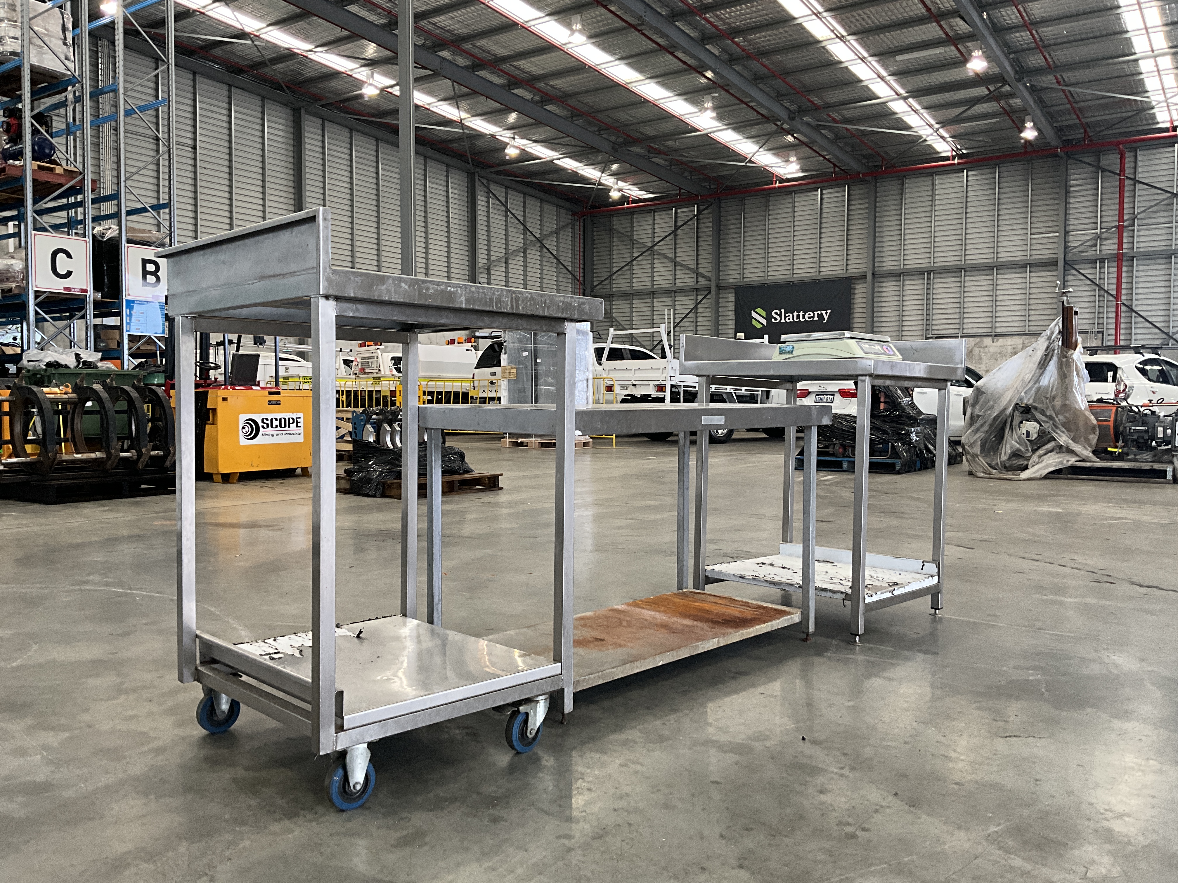Assorted sized commercial tables & scale