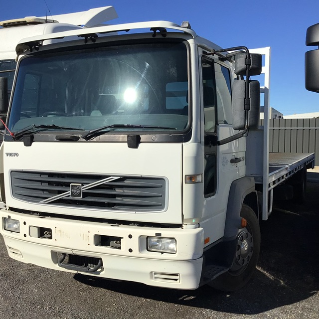 12 · 2002 Volvo FL6H-250   4x2 Tray Truck