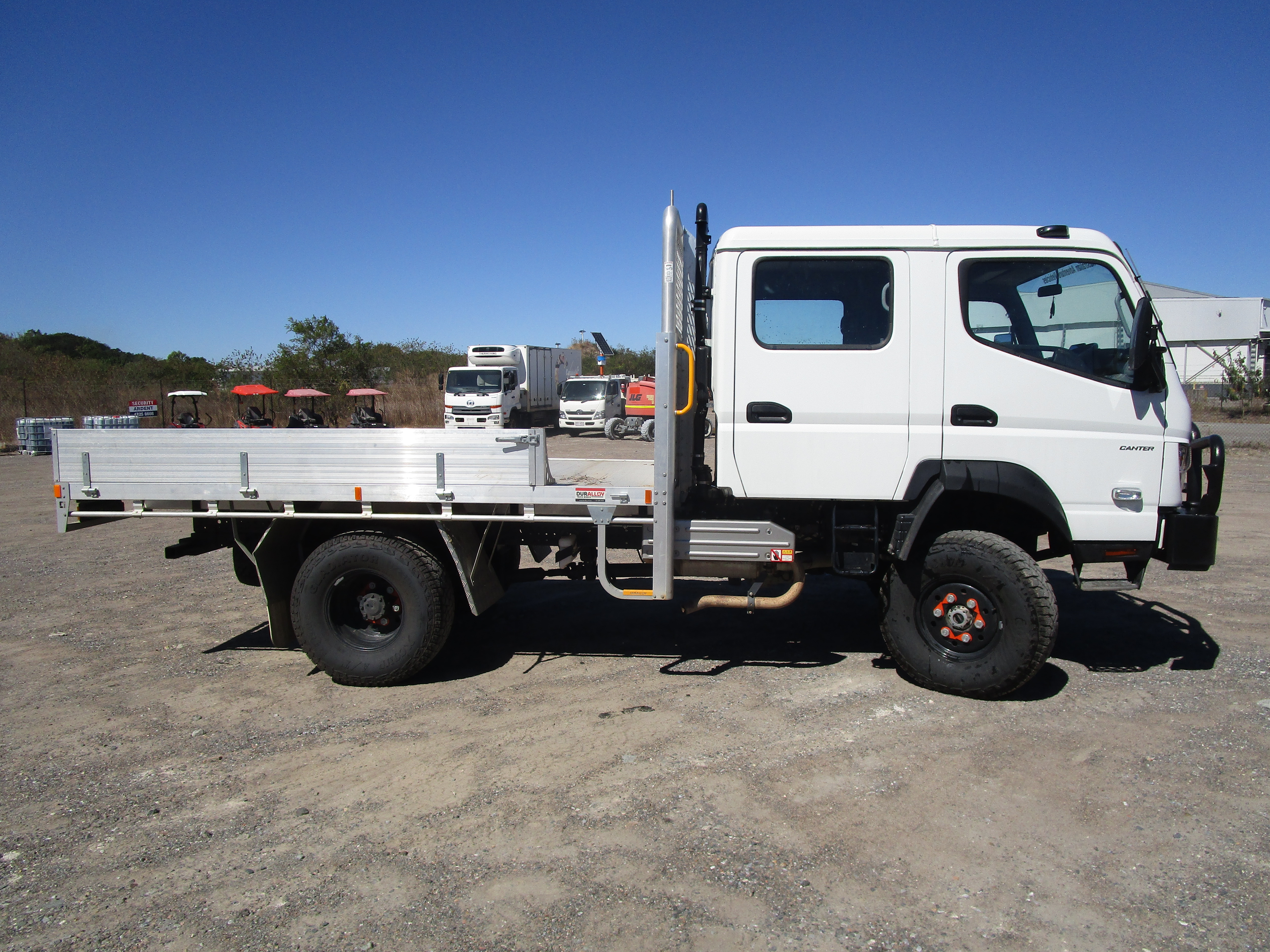 2 · 2025 Mitsubishi Fuso Canter 4x4 Tray Truck