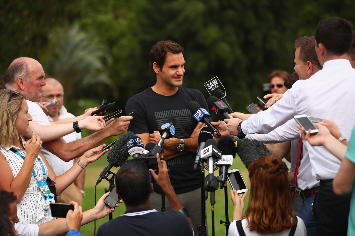 Roger Federer peaks to the media. Pic: Clive Brunskill/Getty Images